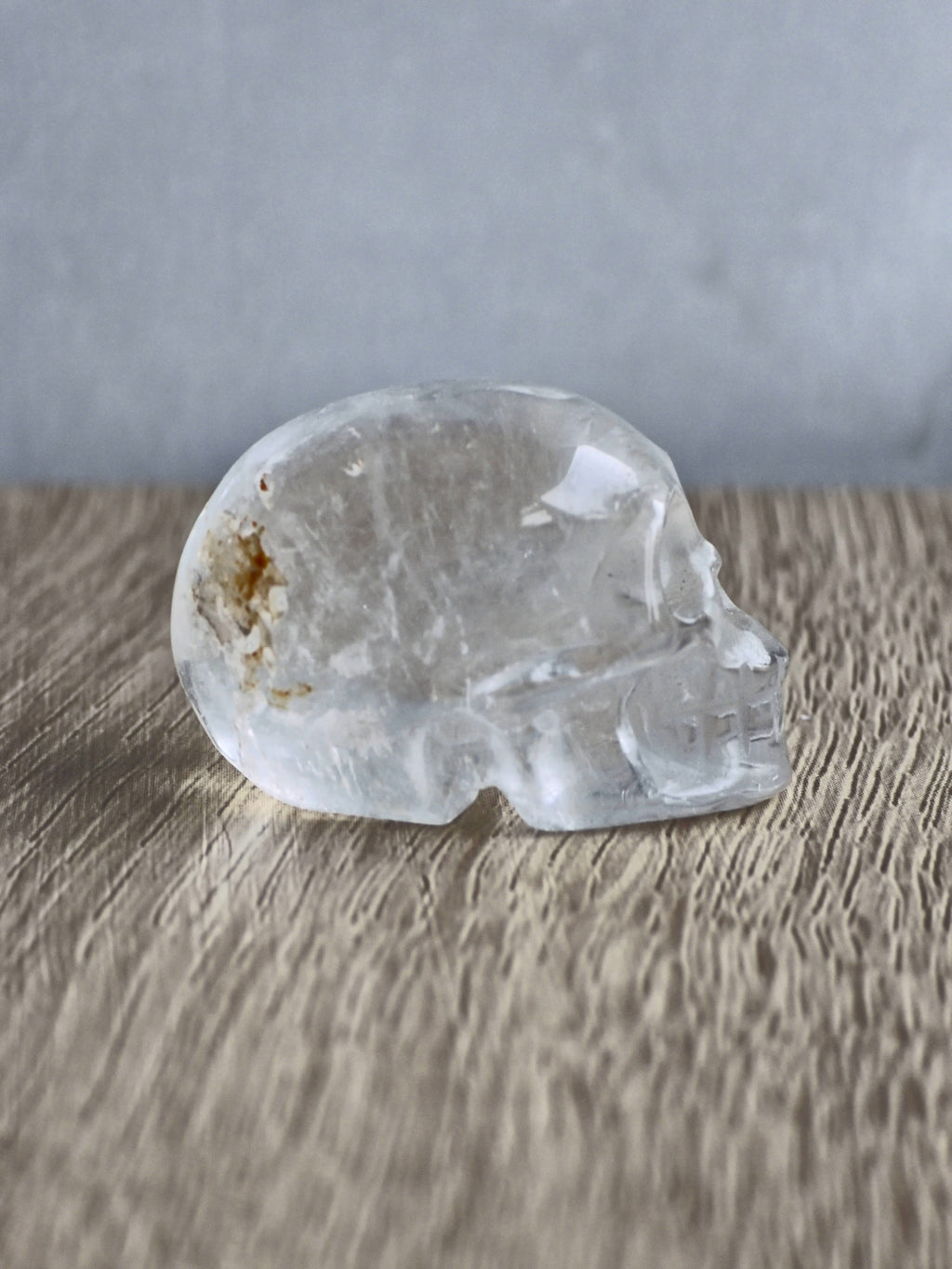 Quartz skull with iron inclusions