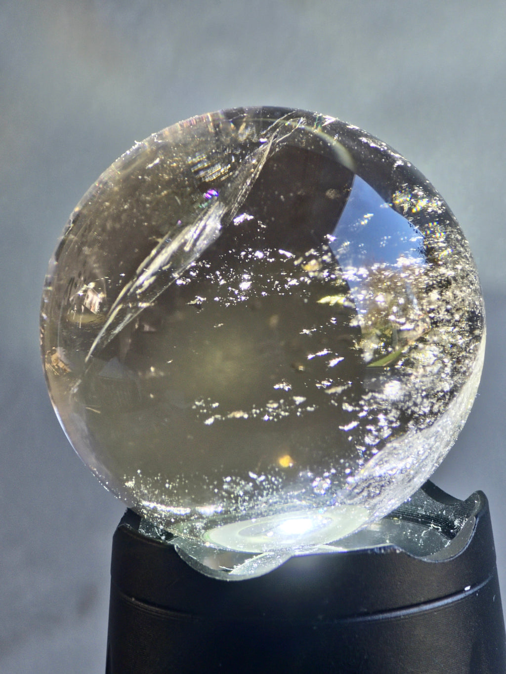Smokey quartz sphere with rainbows - f