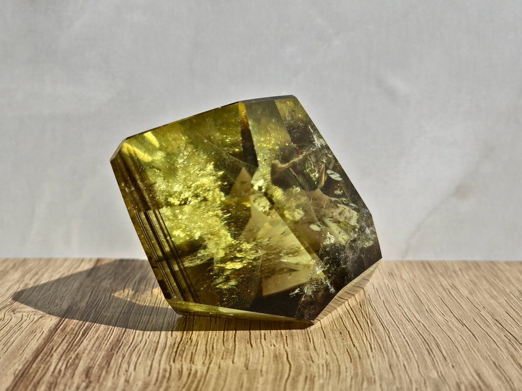 Natural citrine (smoky zoning) with phantom inclusions and rainbow fractures