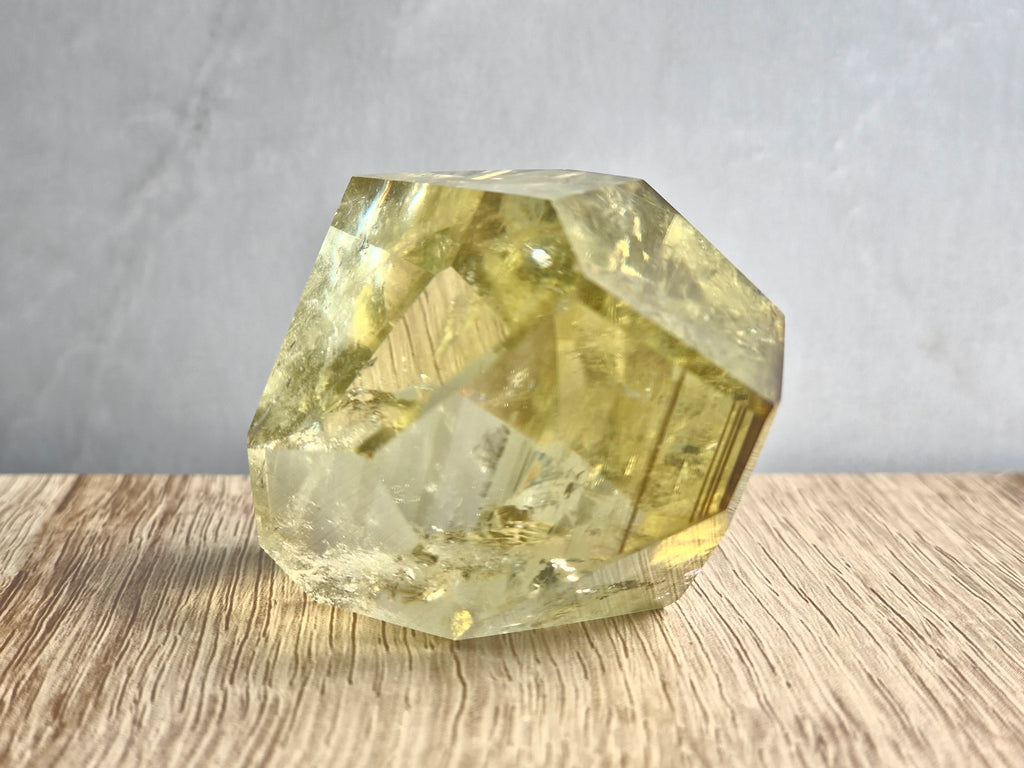 Citrine freeform with phantom lines and rainbow