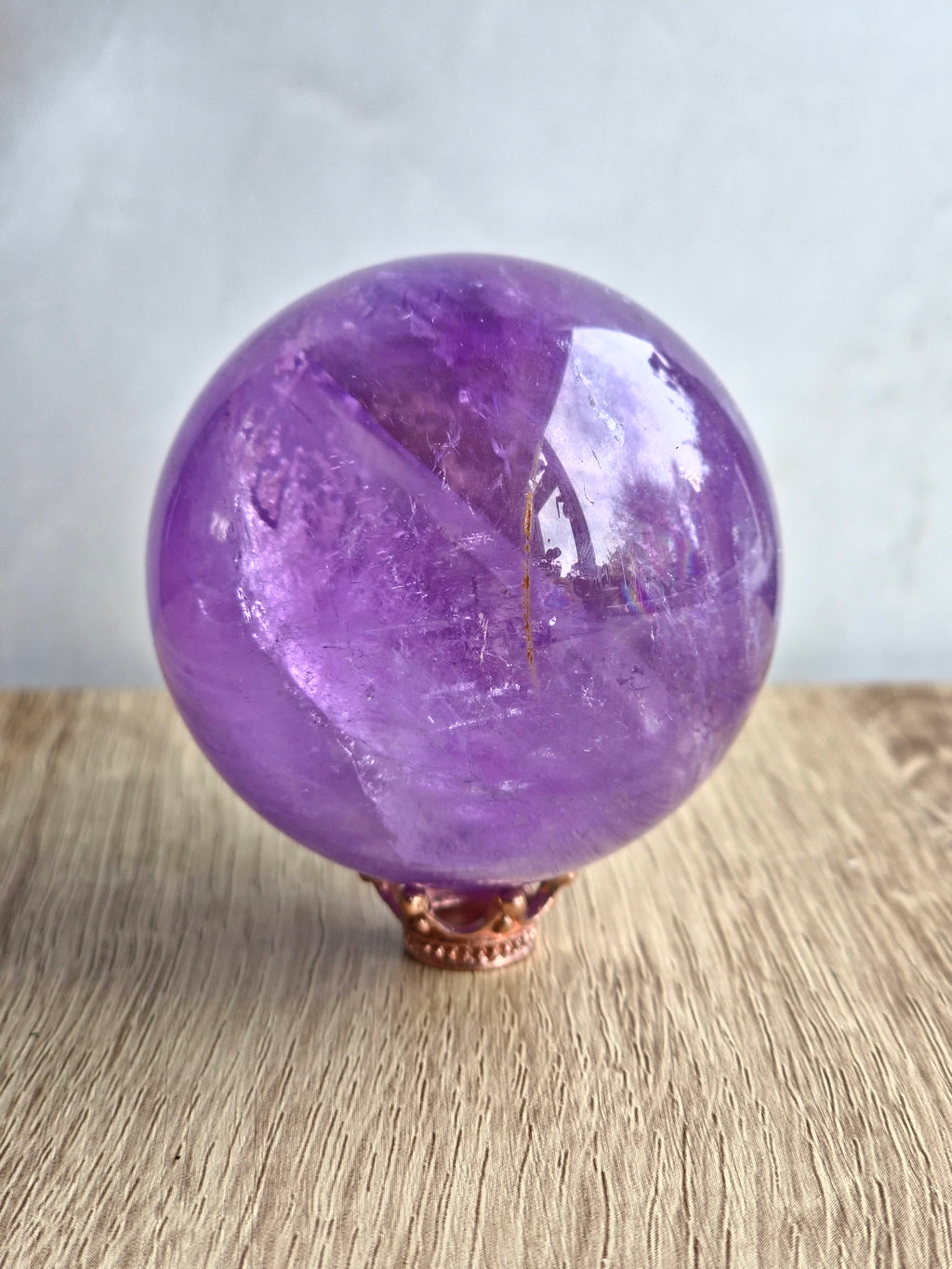 Amethyst sphere with phantom lines and rainbows