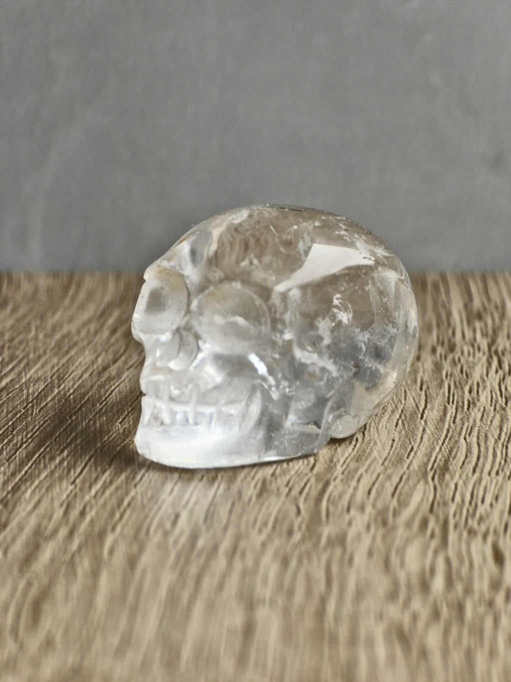 Clear quartz skull with iron inclusions
