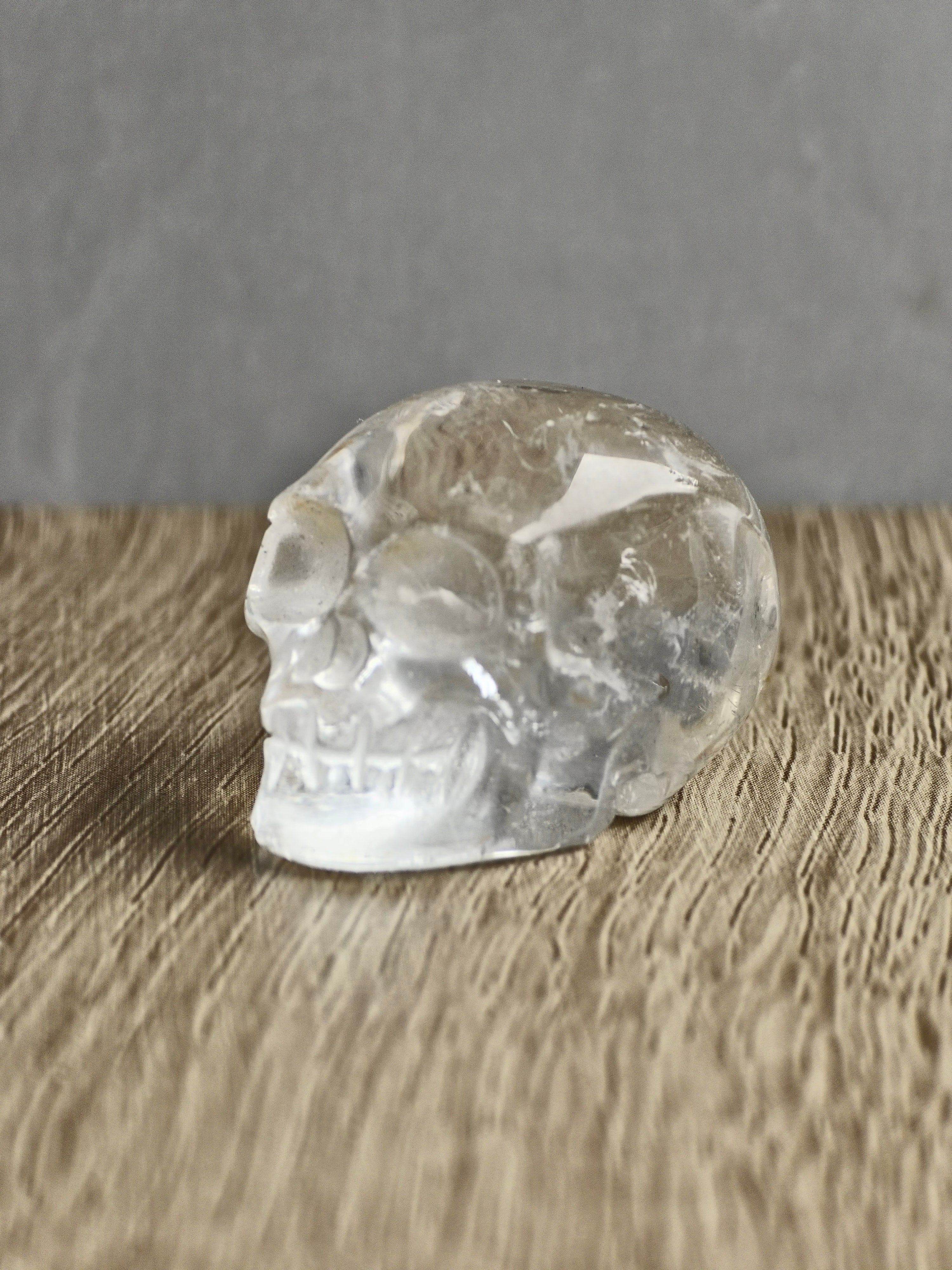 Clear quartz skull with iron inclusions