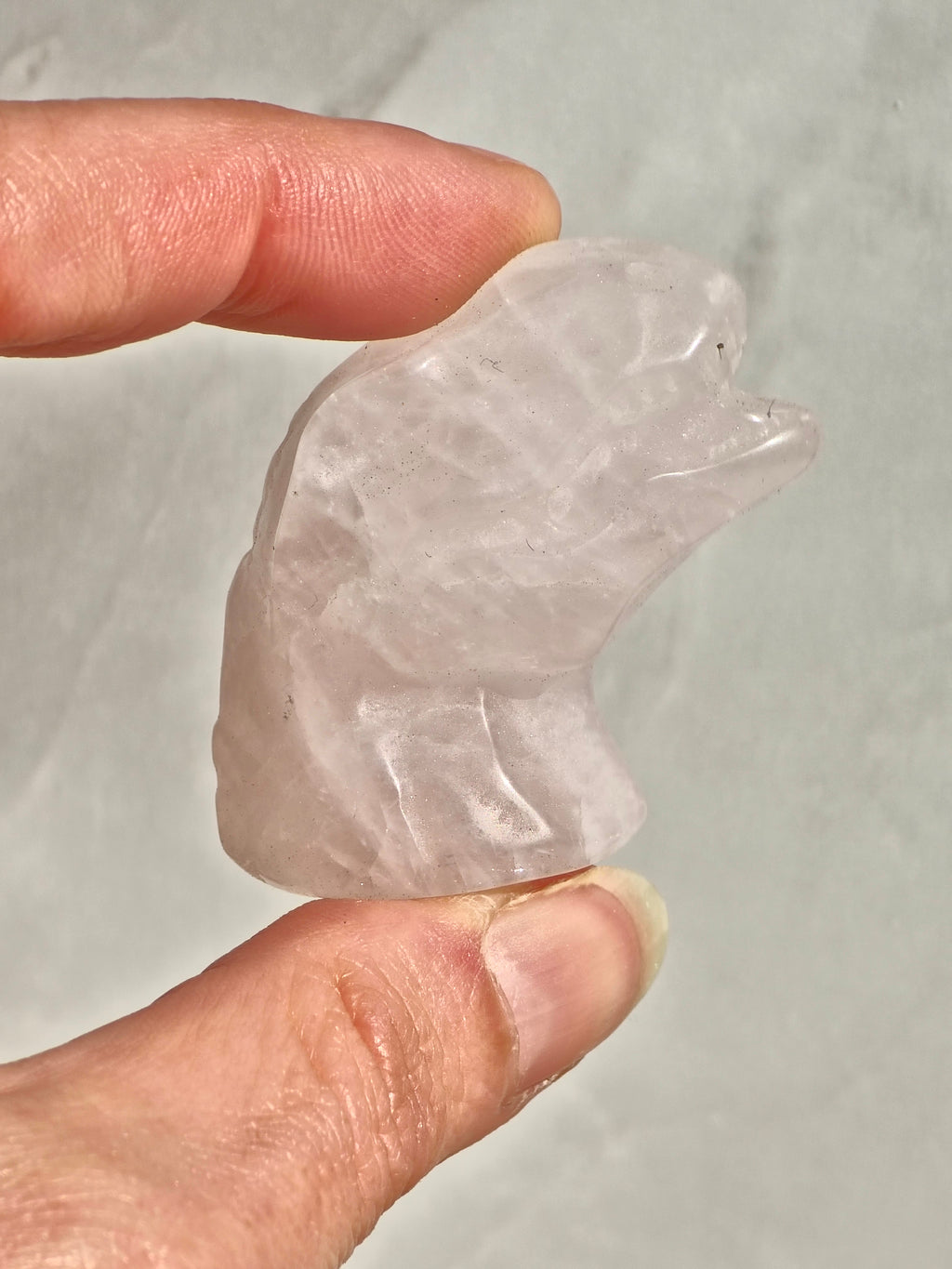 Rose quartz dinosaur head
