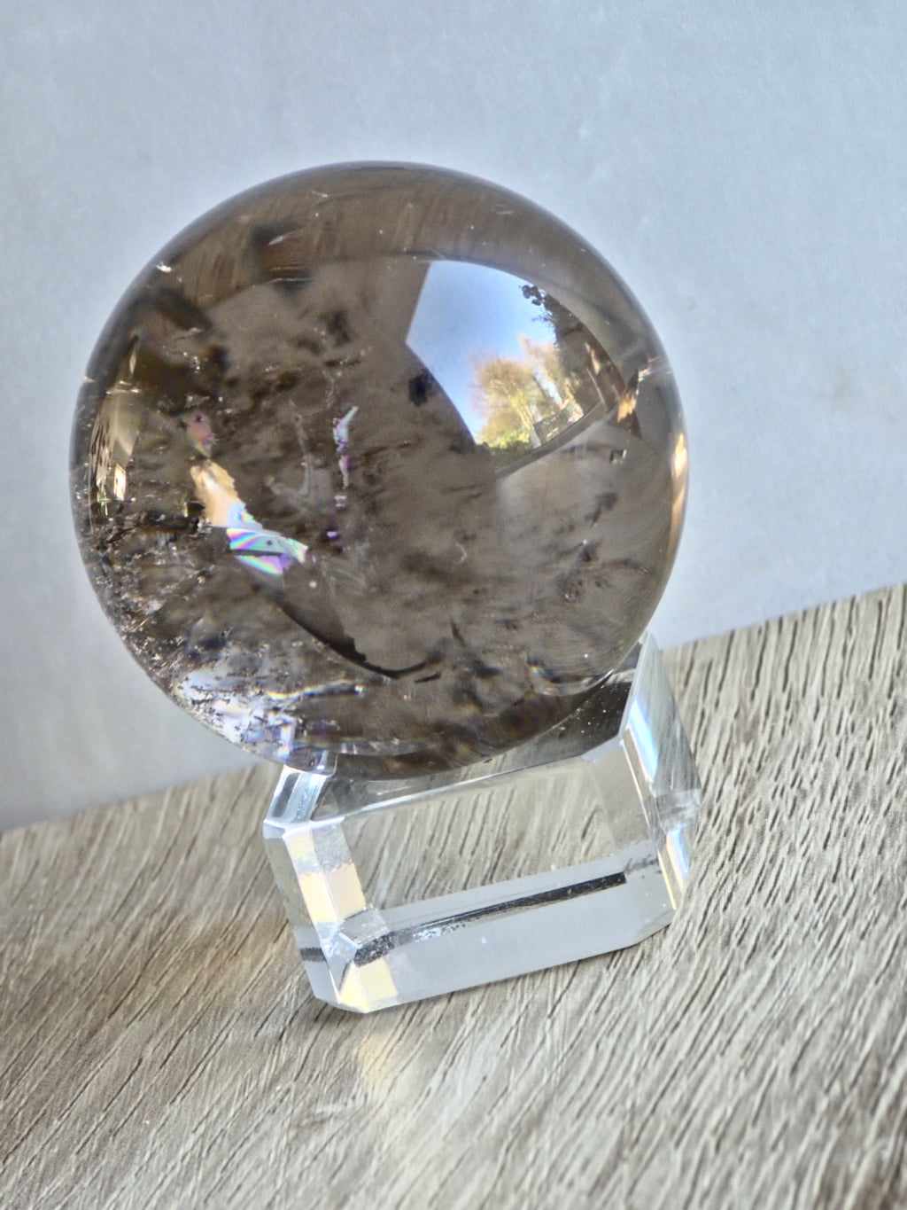 Smokey quartz sphere with rainbows - f