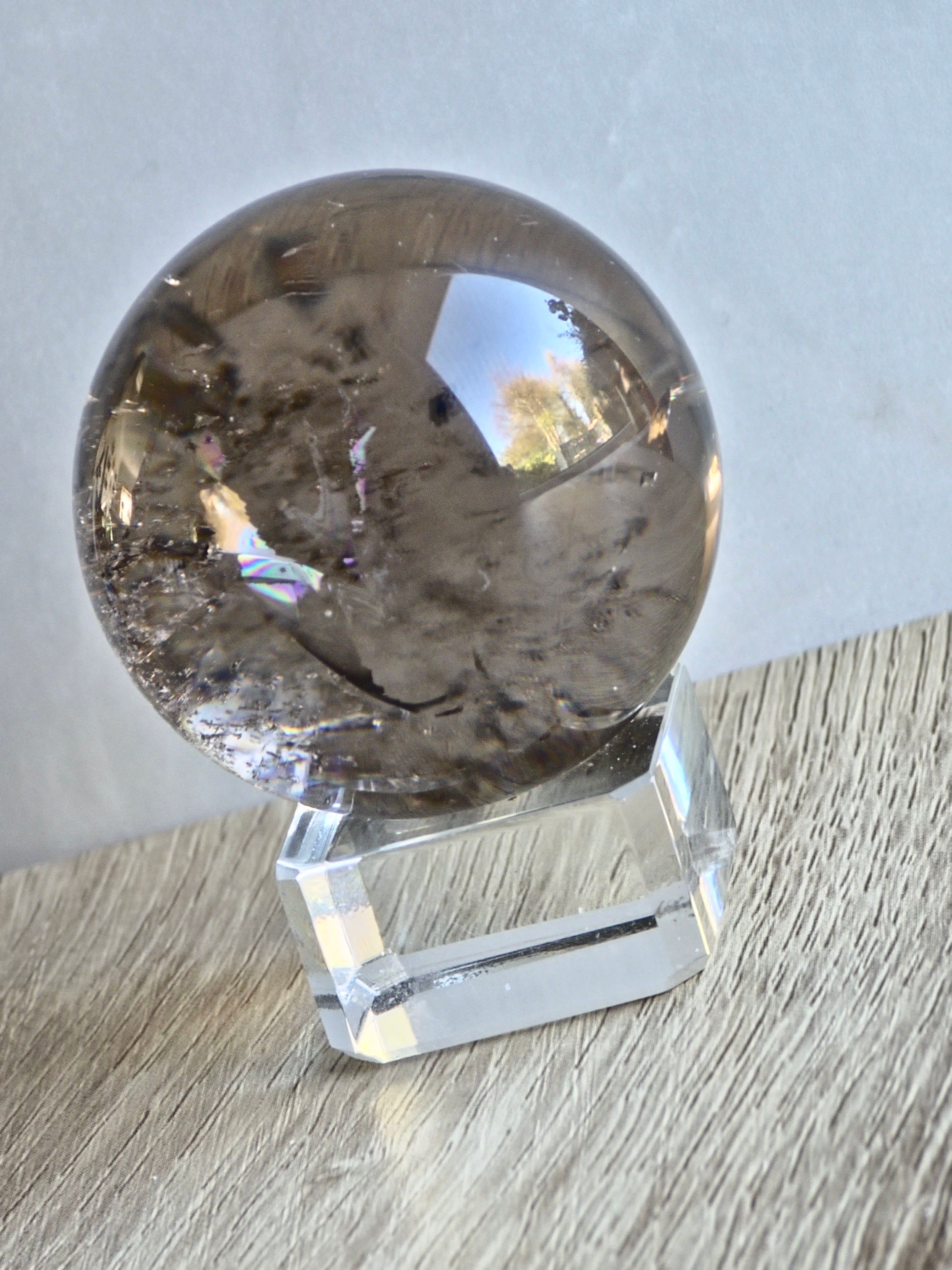 Smokey quartz sphere with rainbows - f