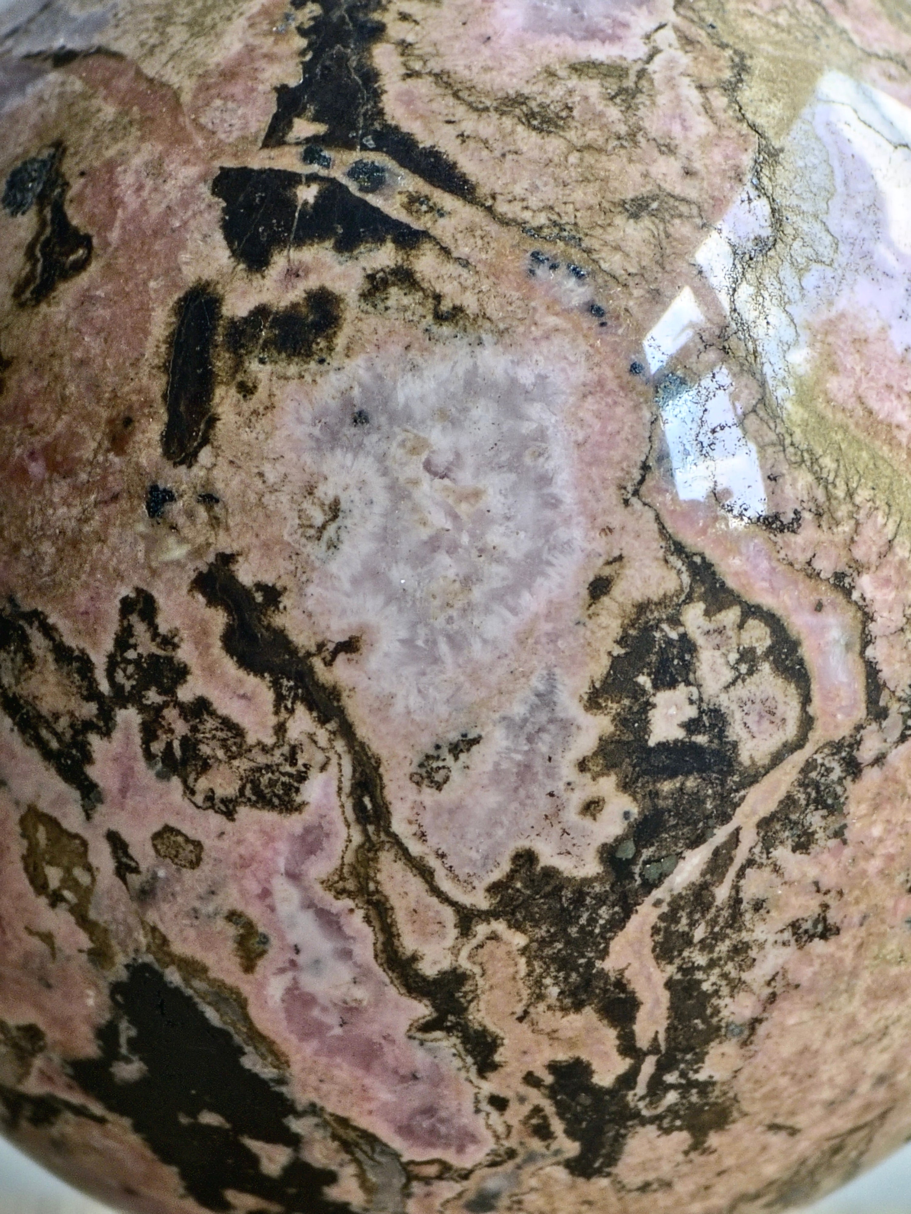 Peruvian Rhodonite Sphere — Pink Manganese Silicate with Quartz Pocket + Manganese Oxide Veining