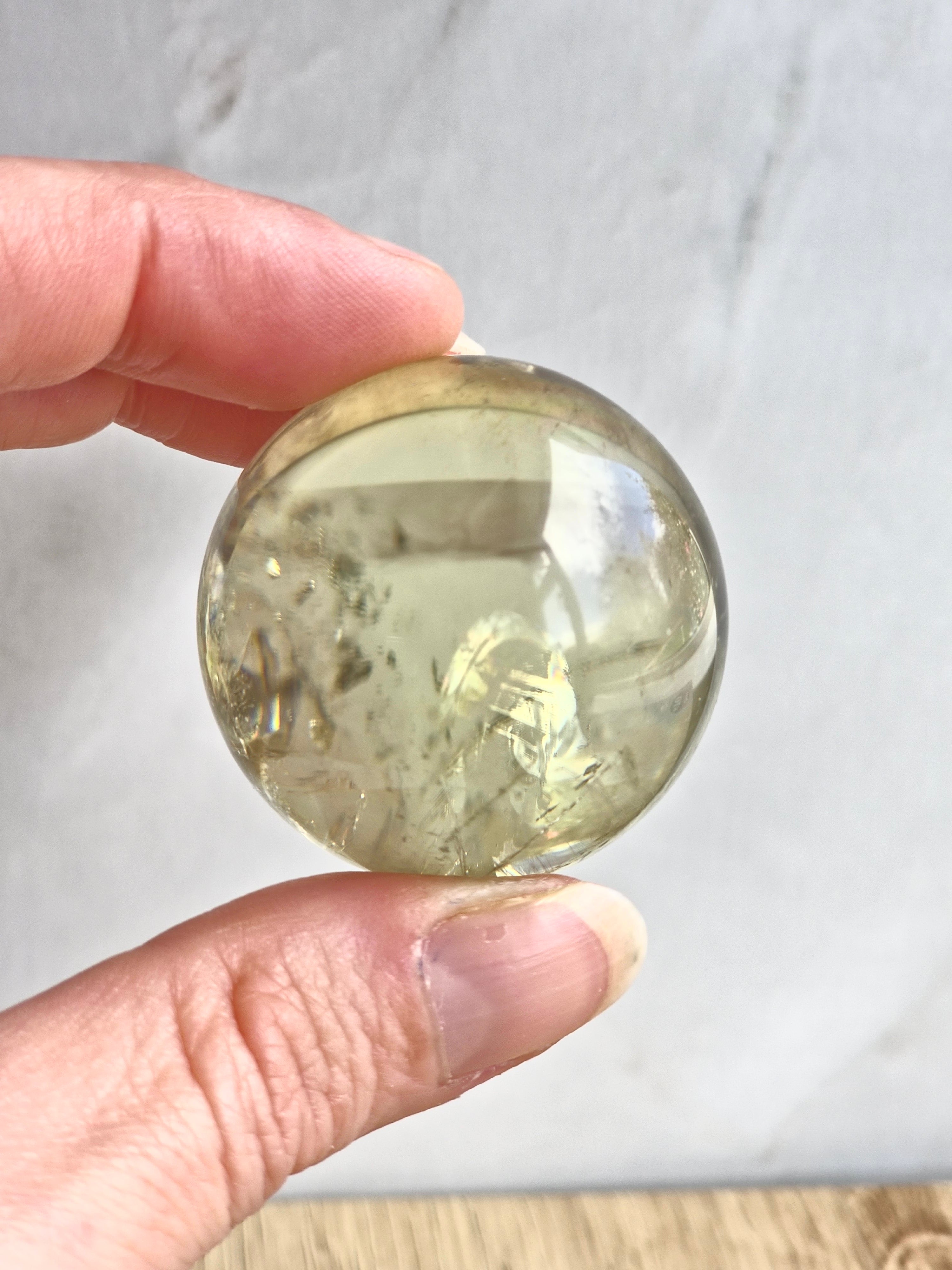 Citrine sphere with phantom a d rainbow
