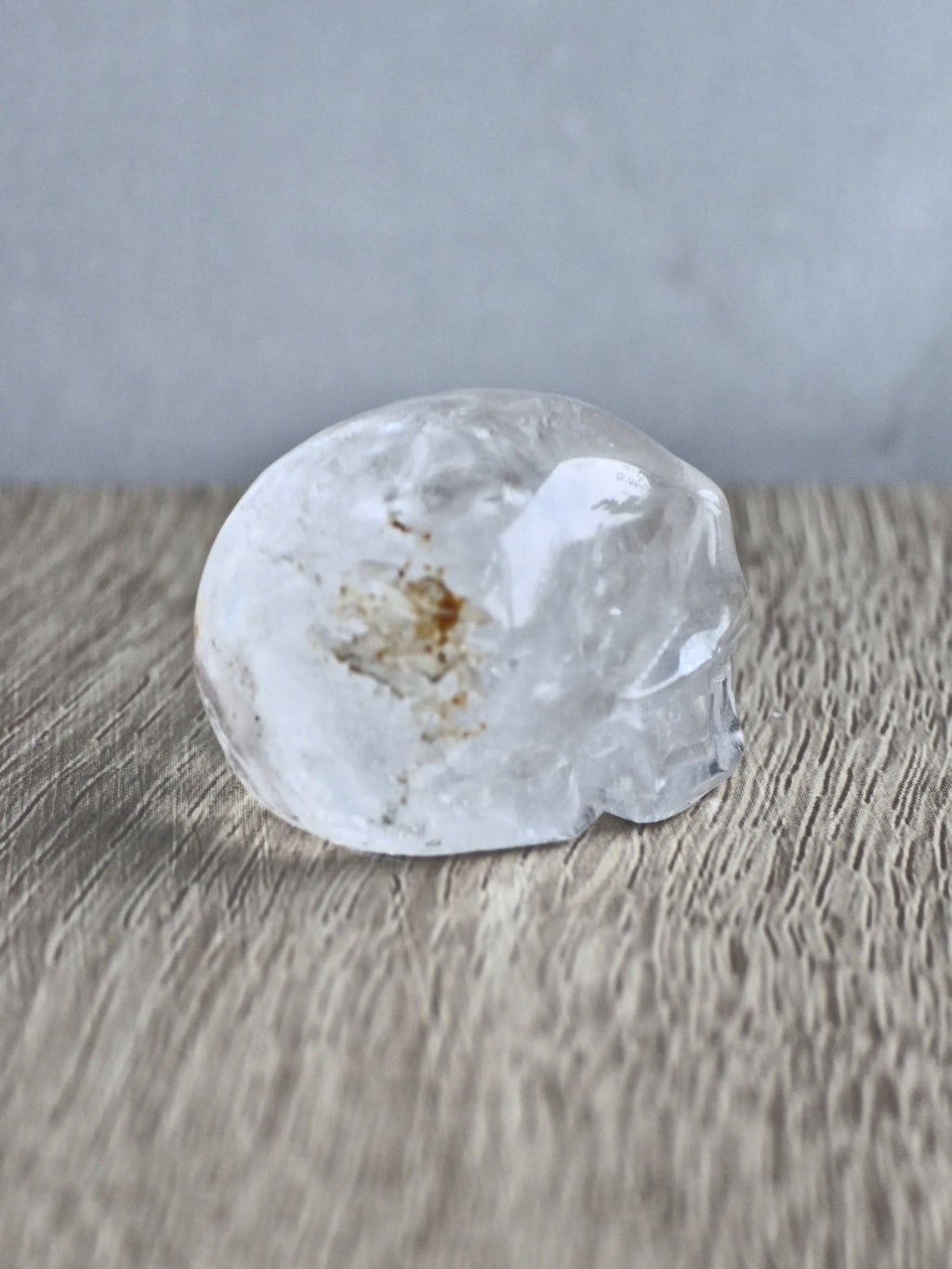 Quartz skull with iron inclusions