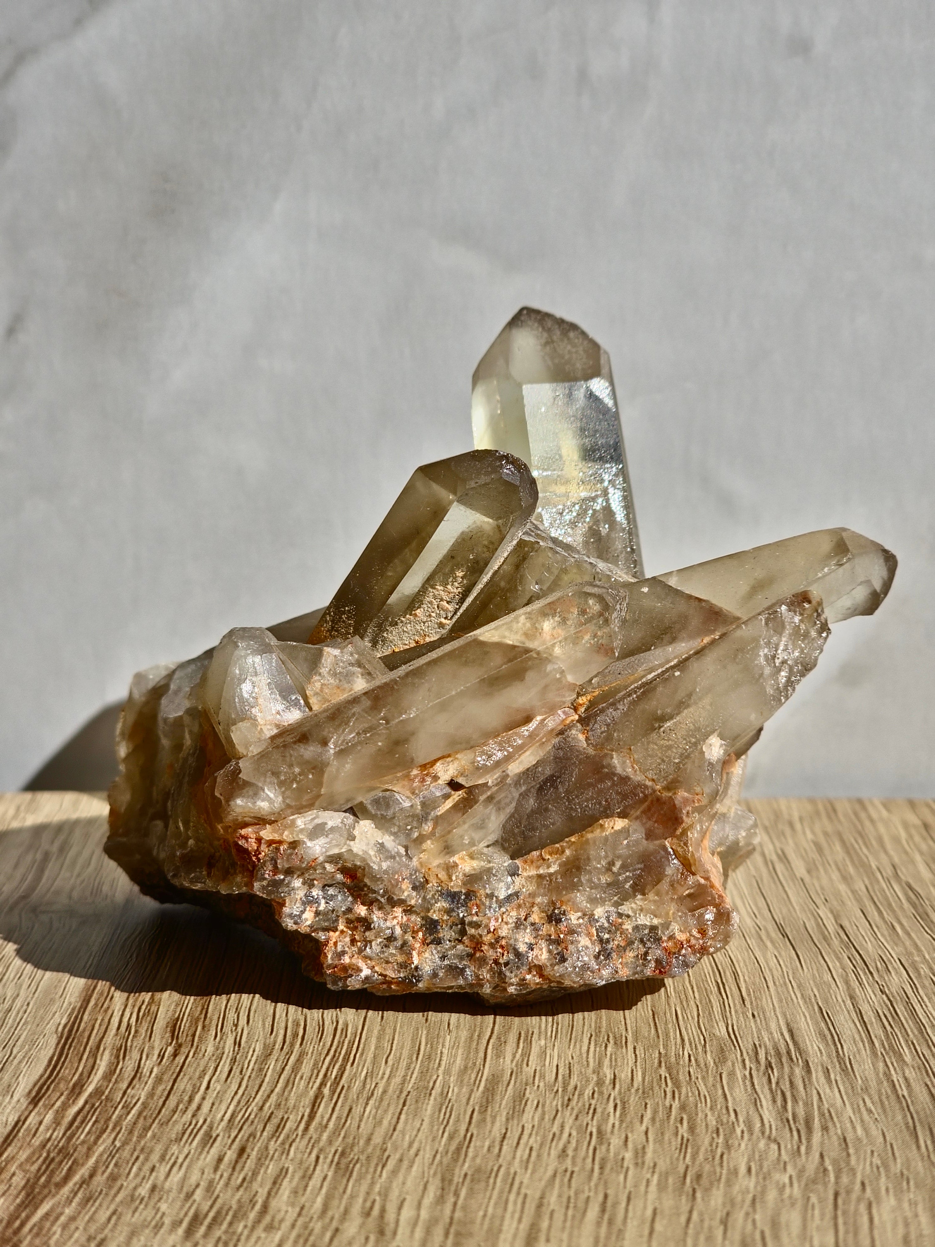 Natural citrine cluster with rainbow inclusion