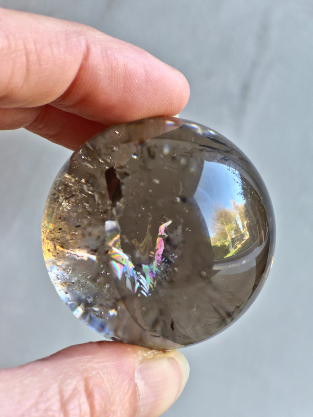 Smokey quartz sphere with rainbows - f