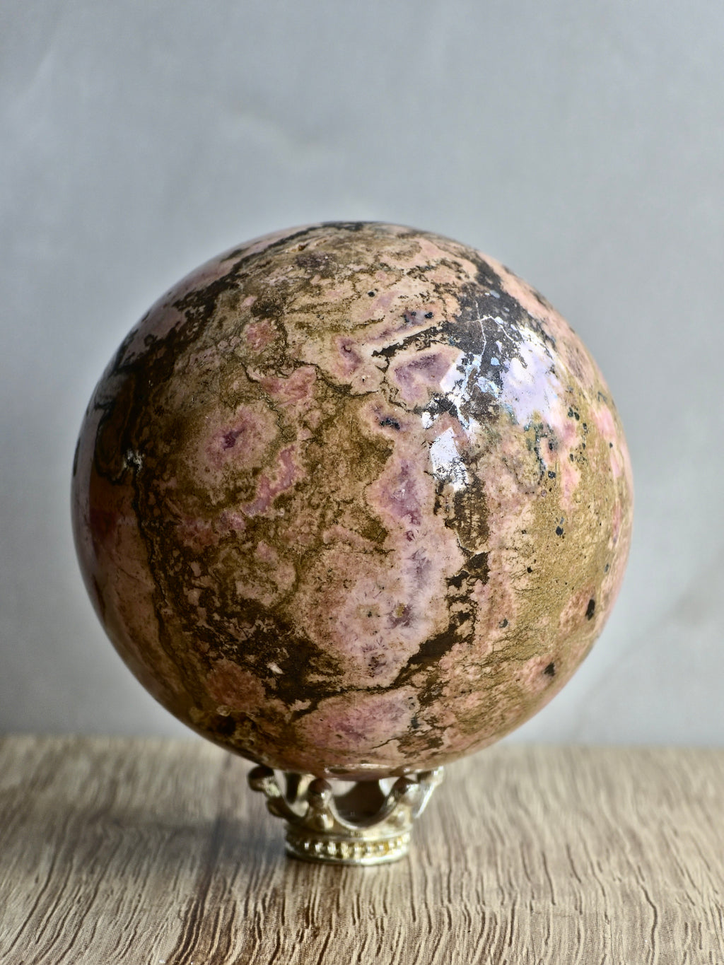 Peruvian Rhodonite Sphere — Pink Manganese Silicate with Quartz Pocket + Manganese Oxide Veining