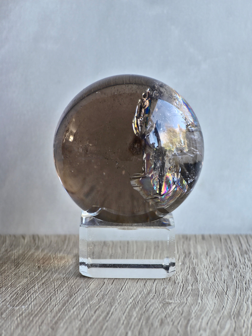 Smokey quartz sphere with rainbows- a