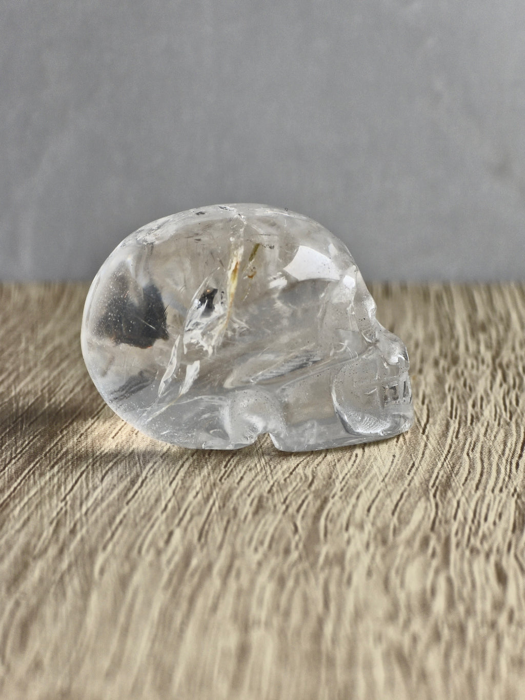 Clear quartz skull with iron inclusions