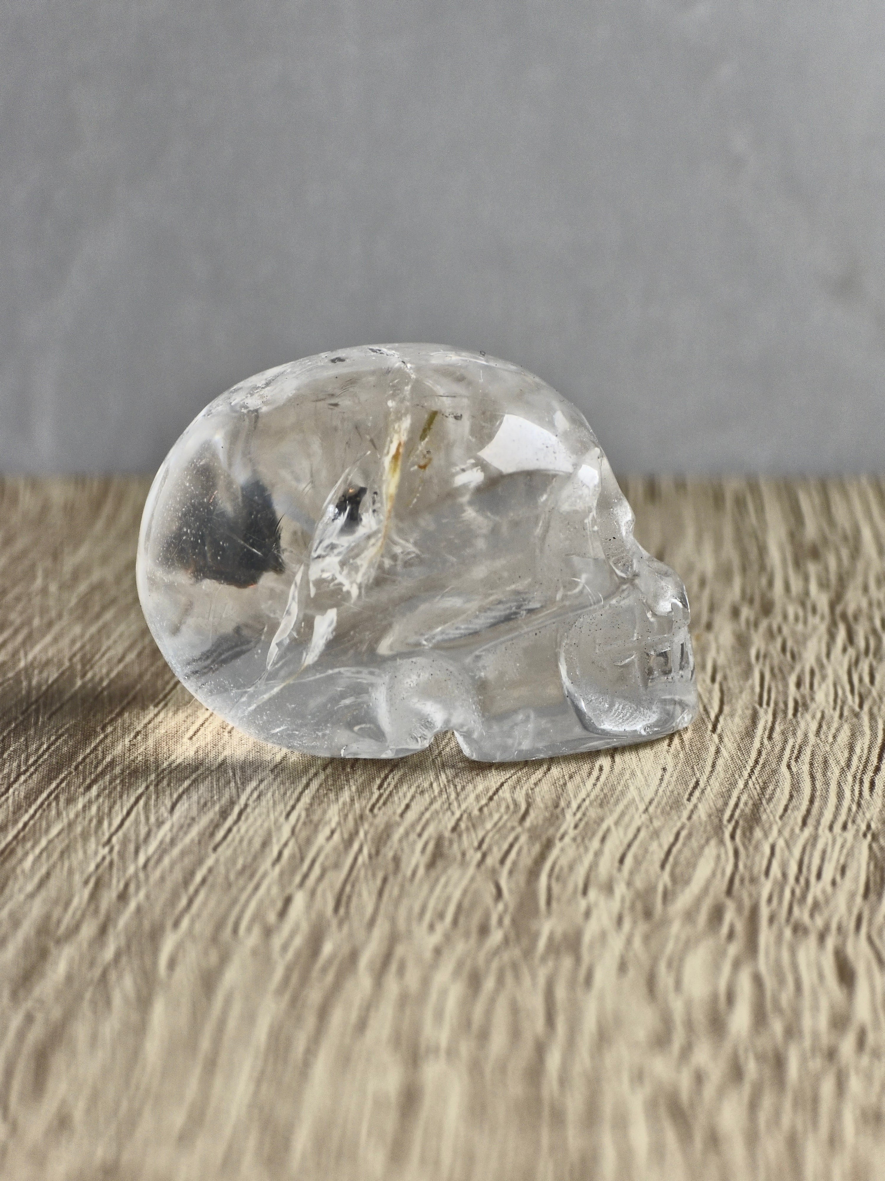 Clear quartz skull with iron inclusions