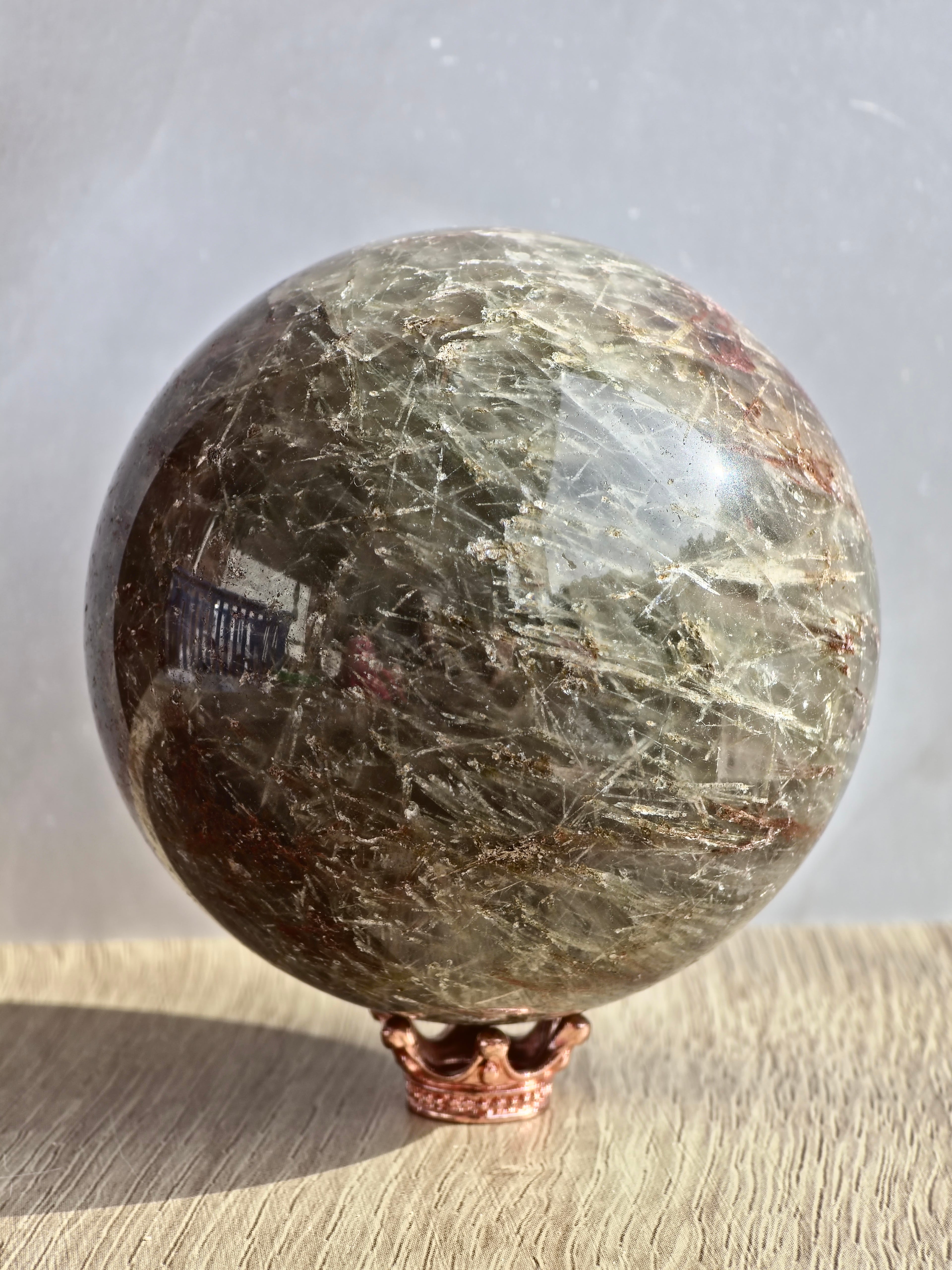 Green and Red Rutile Quartz Sphere
