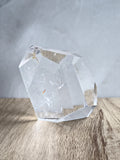 Quartz freeform with small iron inclusion
