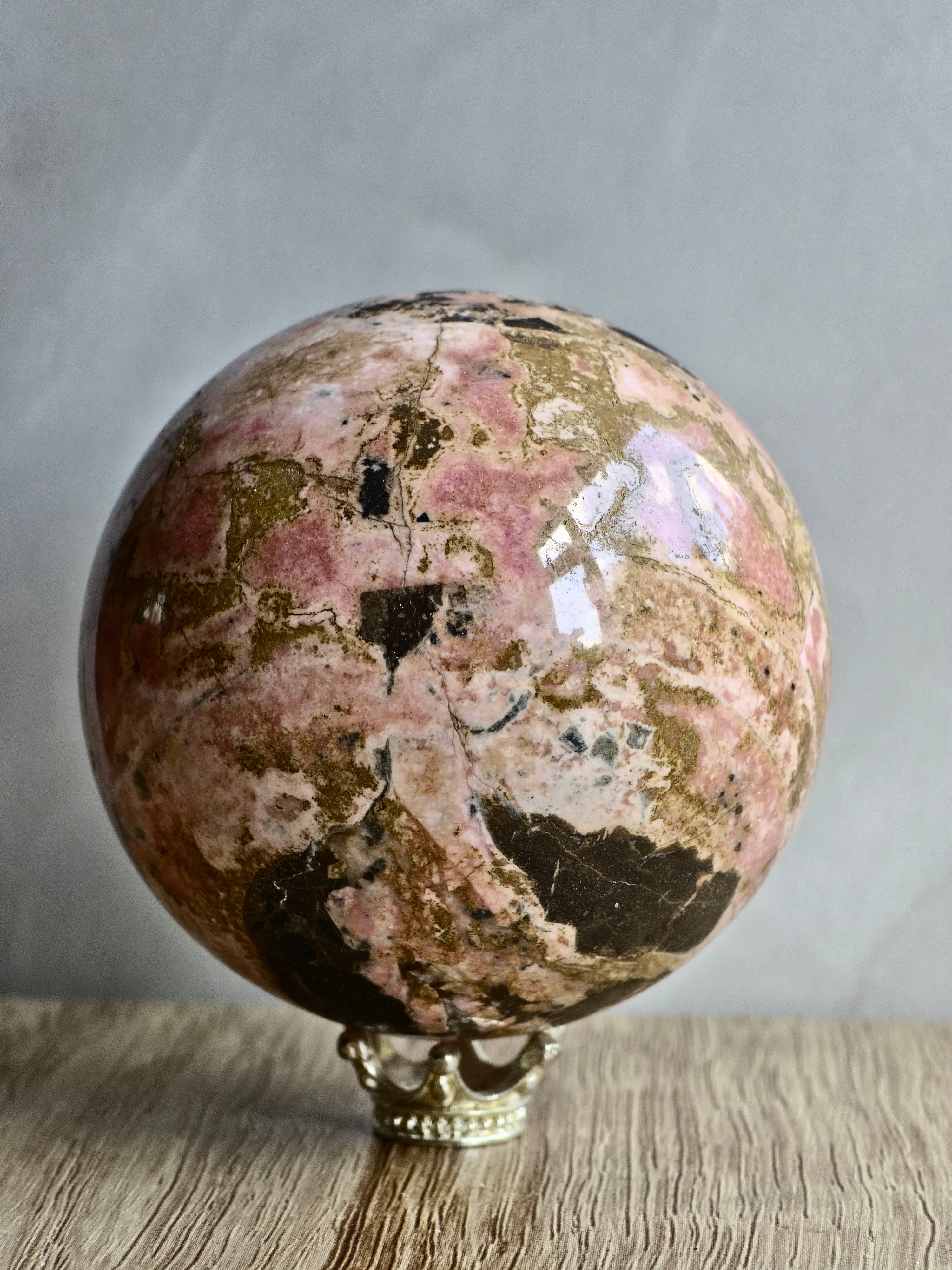 Peruvian Rhodonite Sphere — High-Contrast Pink with Manganese Oxide Matrix