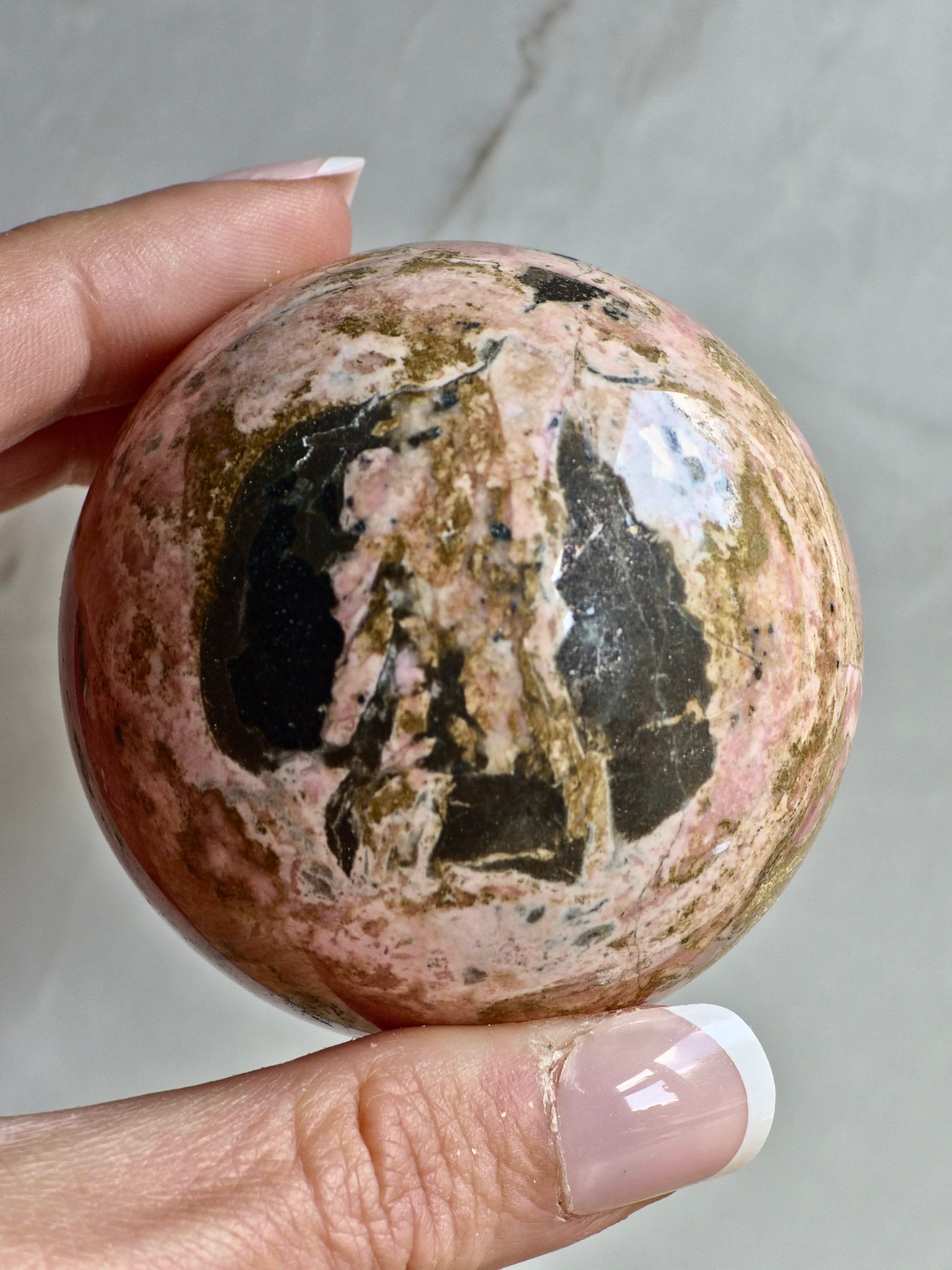 Peruvian Rhodonite Sphere — High-Contrast Pink with Manganese Oxide Matrix