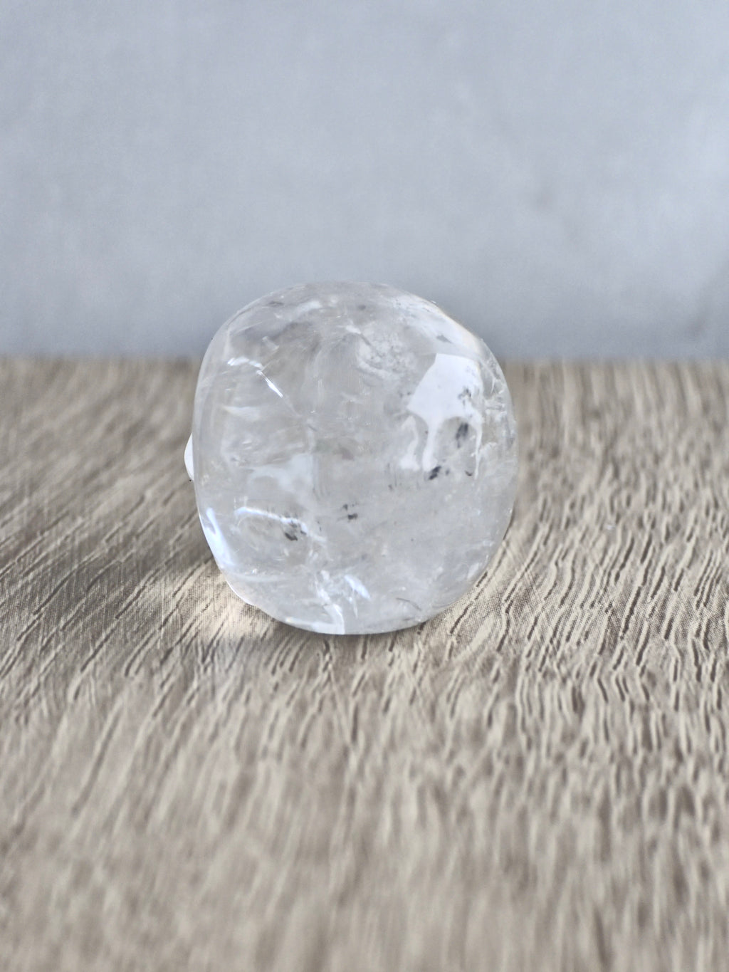 Clear quartz skull with rainbow - c