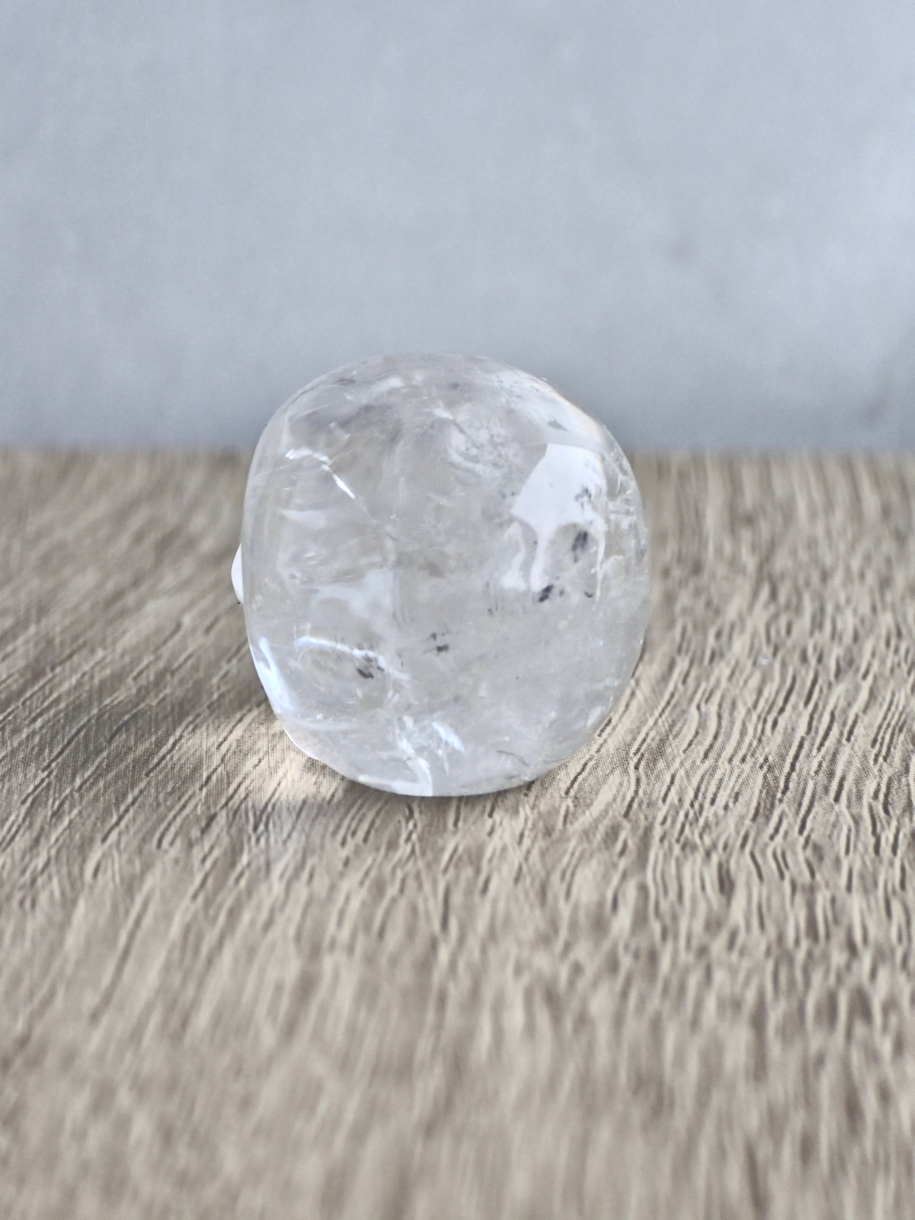Clear quartz skull with rainbow - c