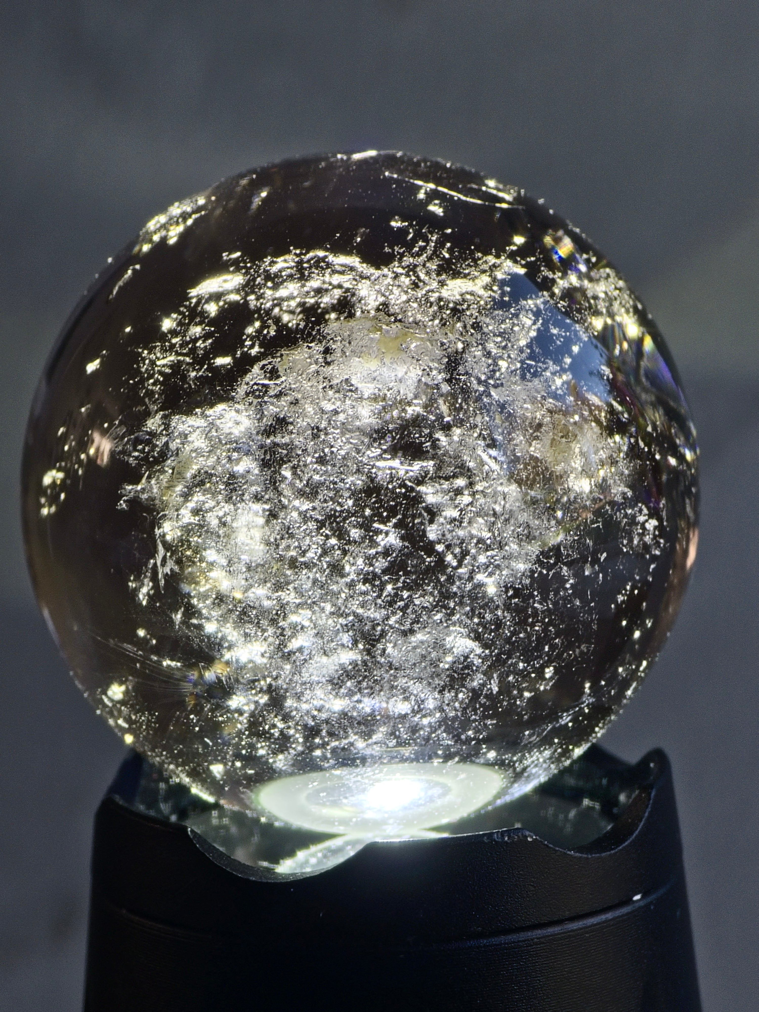 Smokey quartz sphere with rainbows - f
