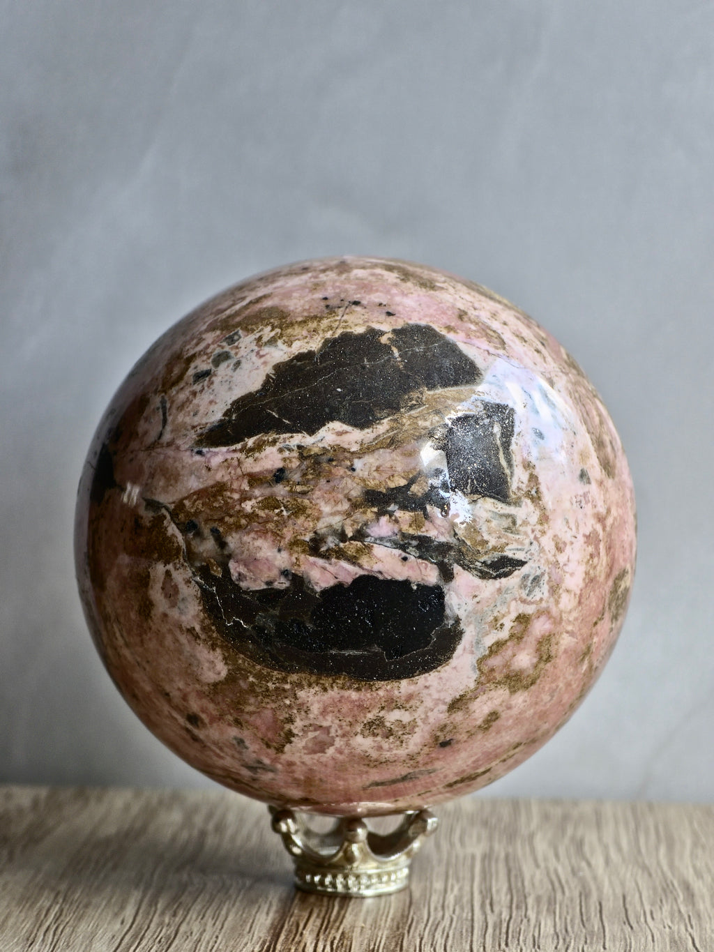 Peruvian Rhodonite Sphere — High-Contrast Pink with Manganese Oxide Matrix