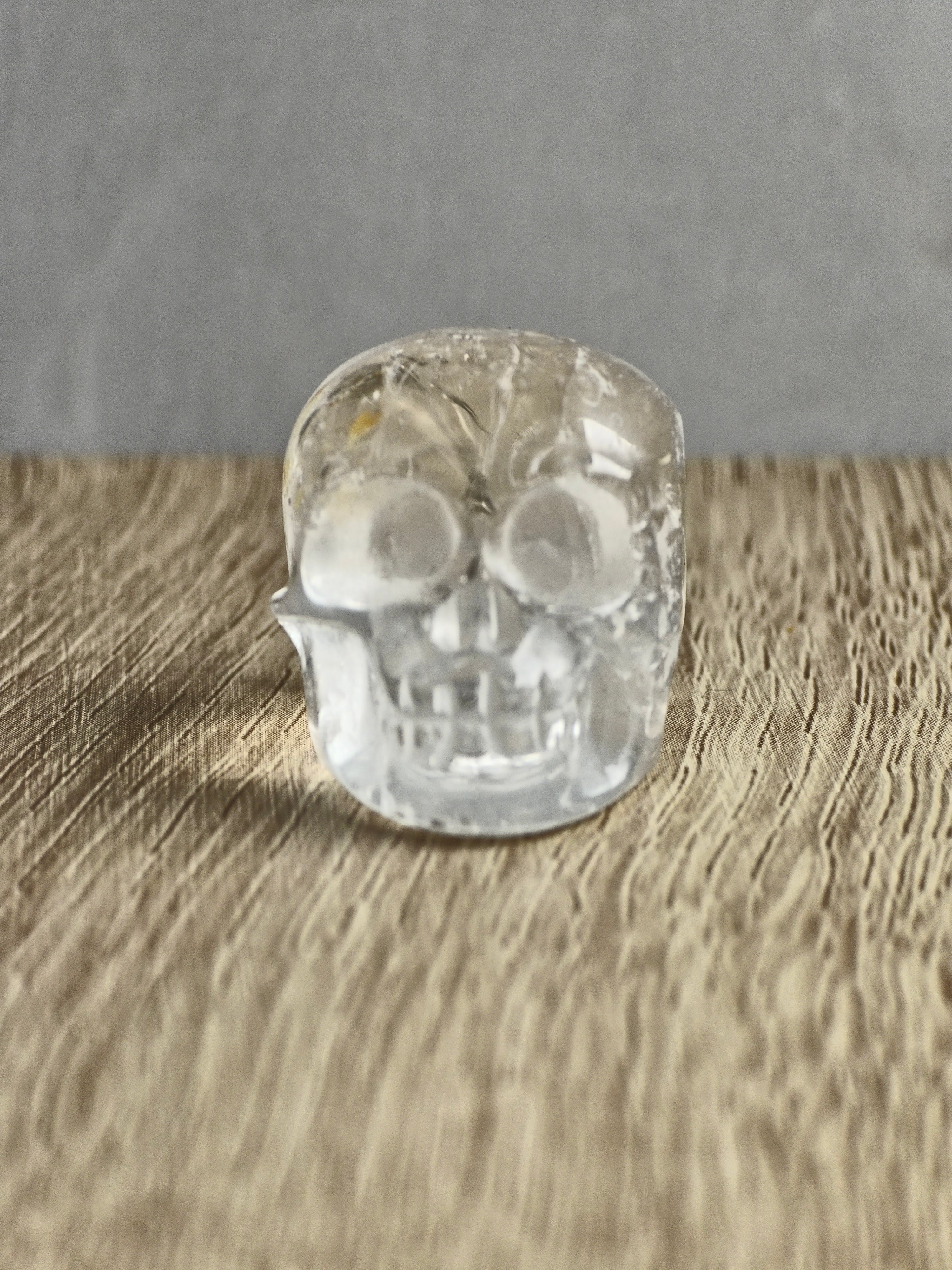 Clear quartz skull with iron inclusions