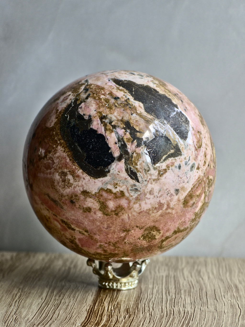 Peruvian Rhodonite Sphere — High-Contrast Pink with Manganese Oxide Matrix