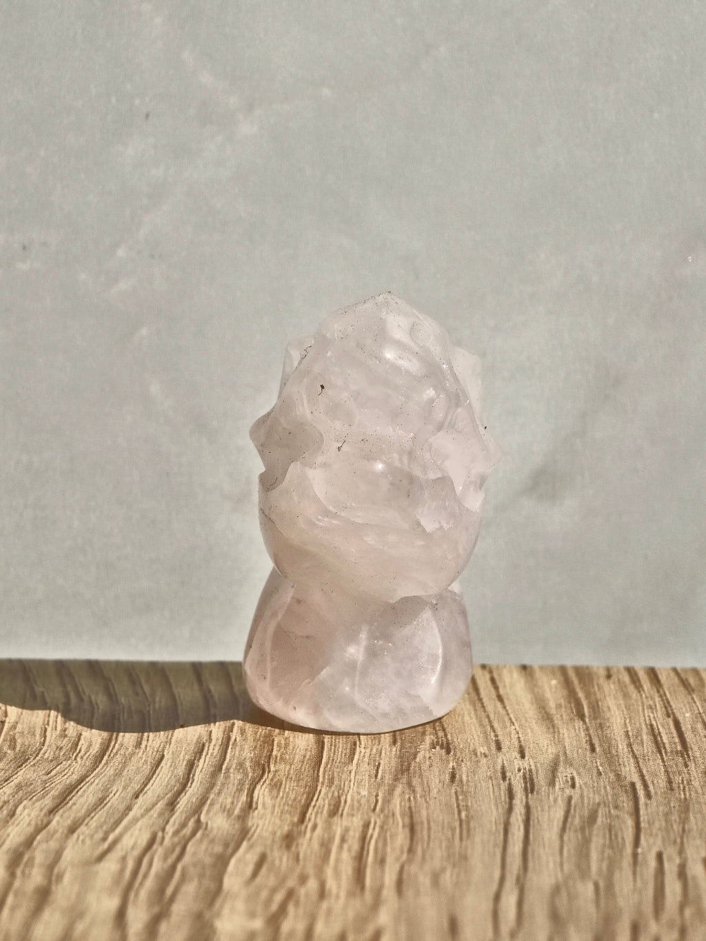 Rose quartz dinosaur head