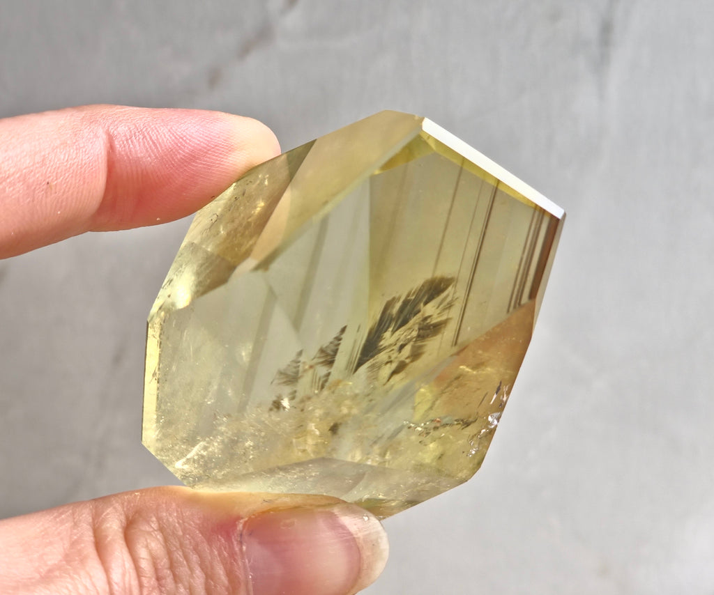 Citrine freeform with phantom lines and rainbow