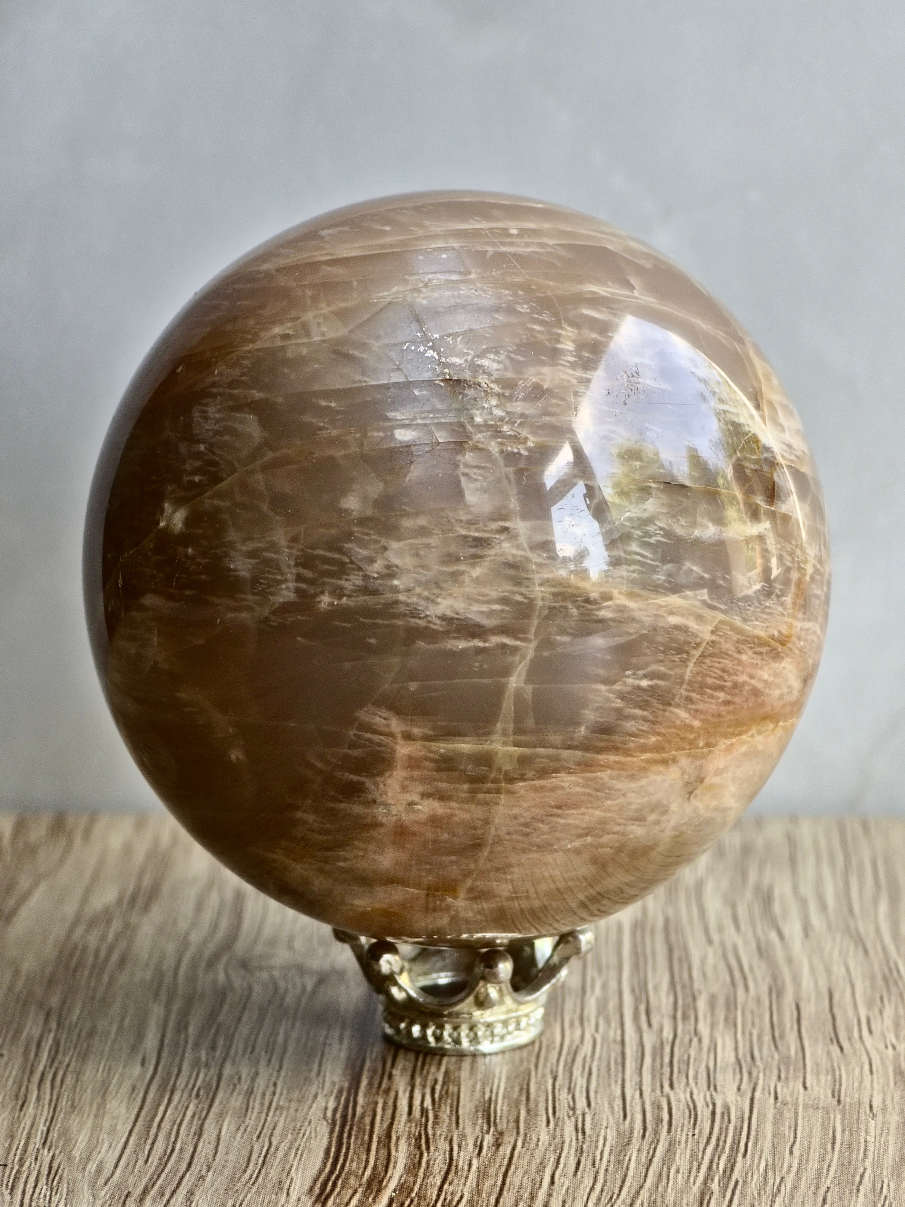 Peach Moonstone Sphere — Layered Feldspar with Strong Adularescence + Structural Zoning