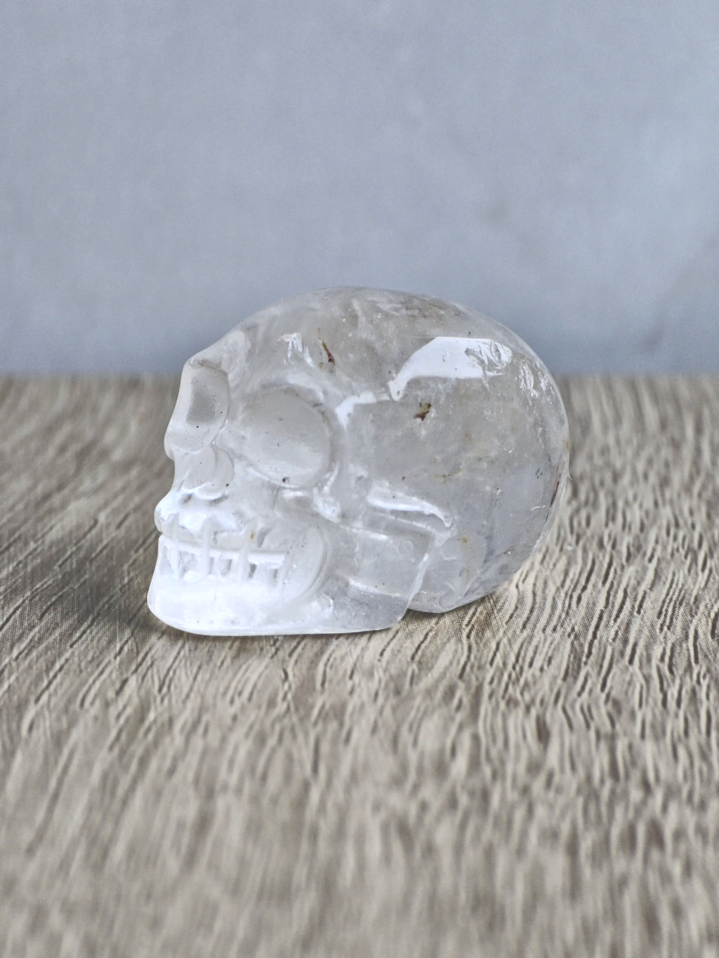 Quartz skull with iron inclusions