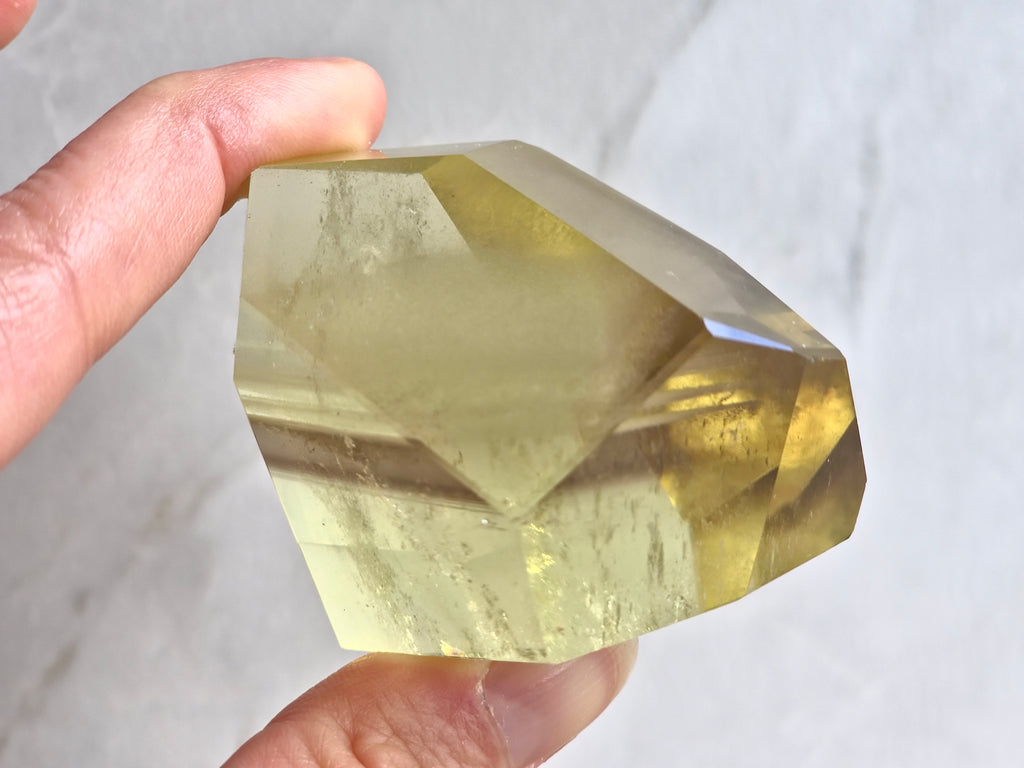 Citrine freeform with white and smoky phantom lines
