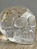 Clear quartz skull with iron inclusions