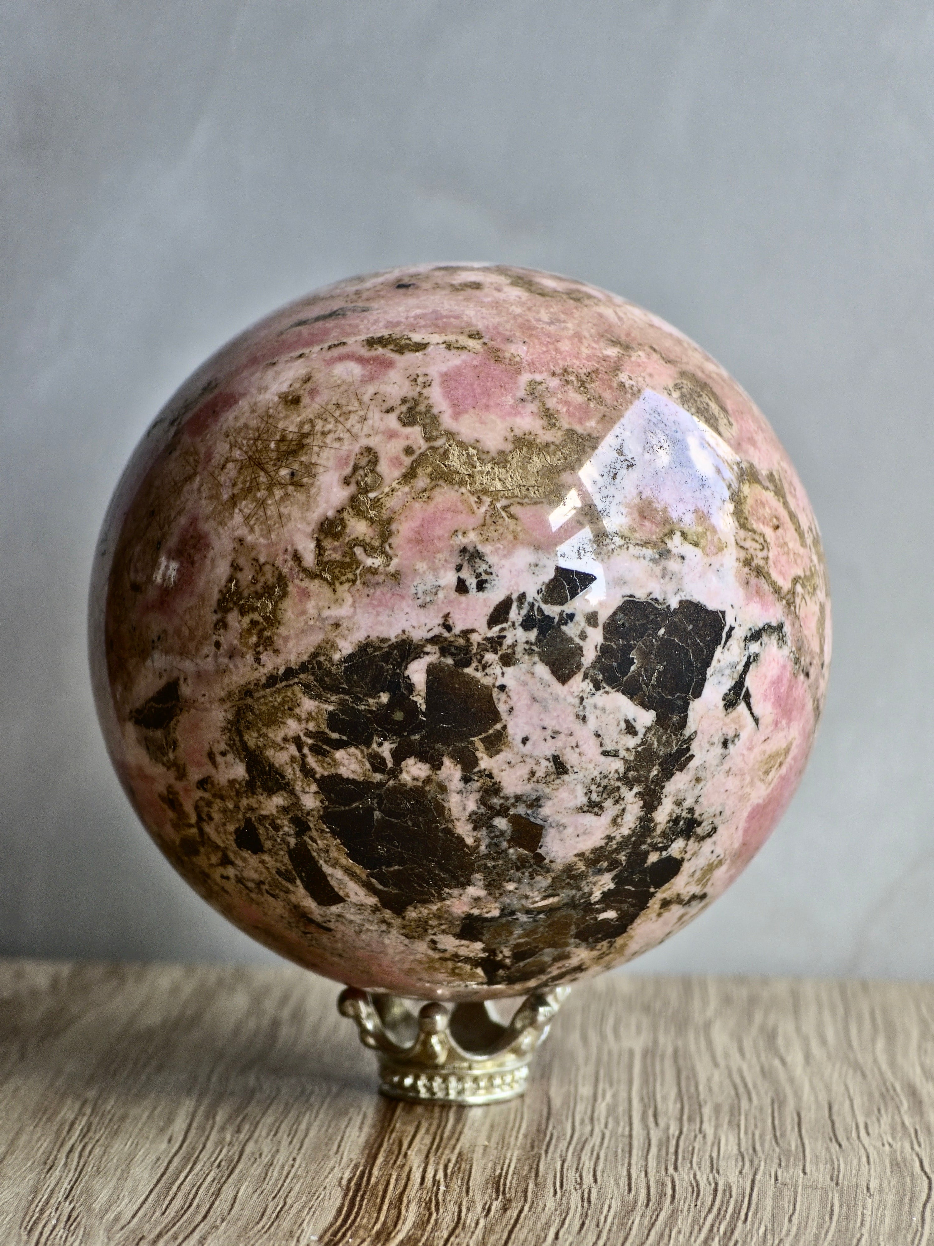 Peruvian Rhodonite Sphere — High-Contrast Pink with Manganese Oxide Matrix