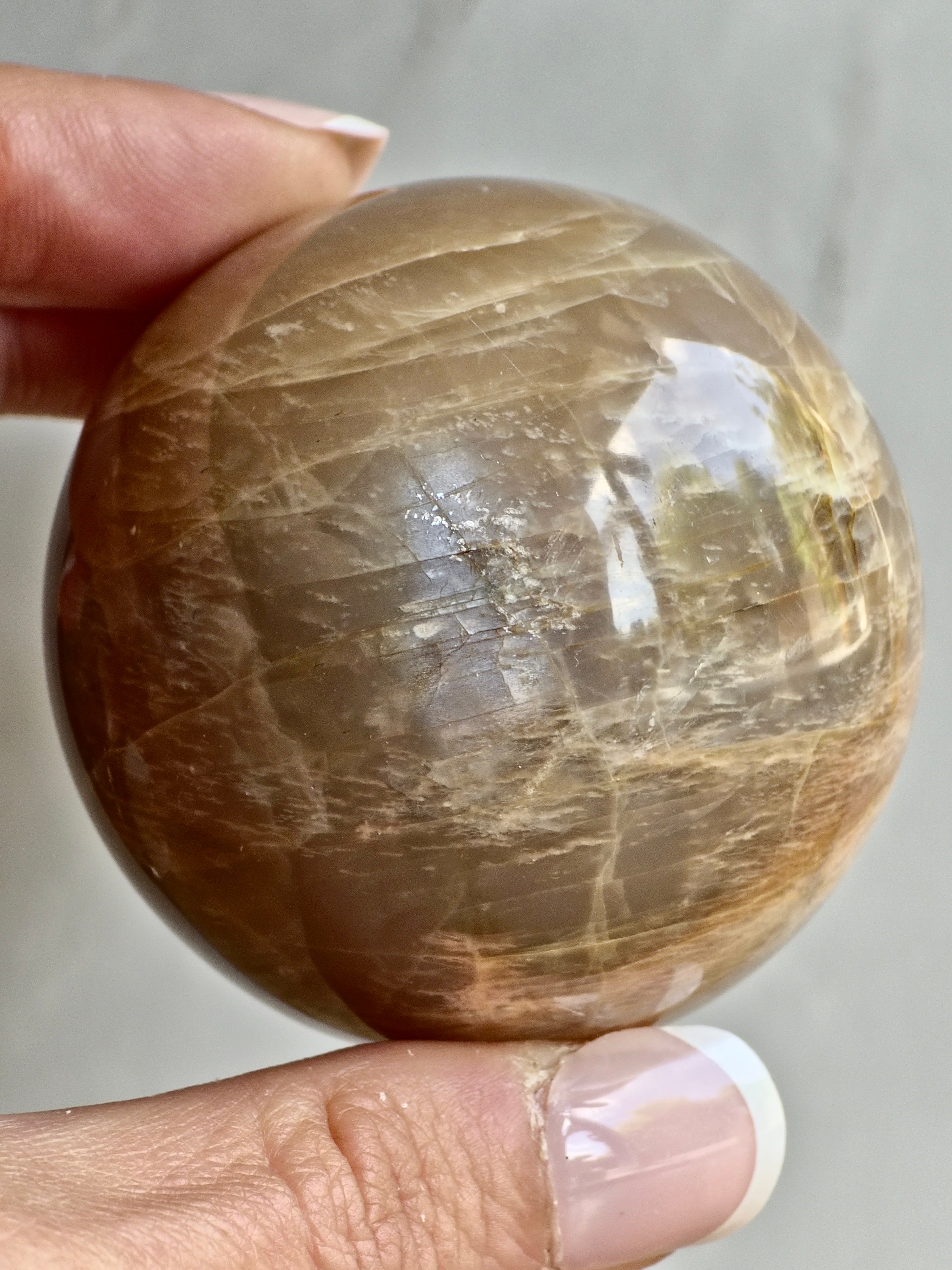 Peach Moonstone Sphere — Layered Feldspar with Strong Adularescence + Structural Zoning