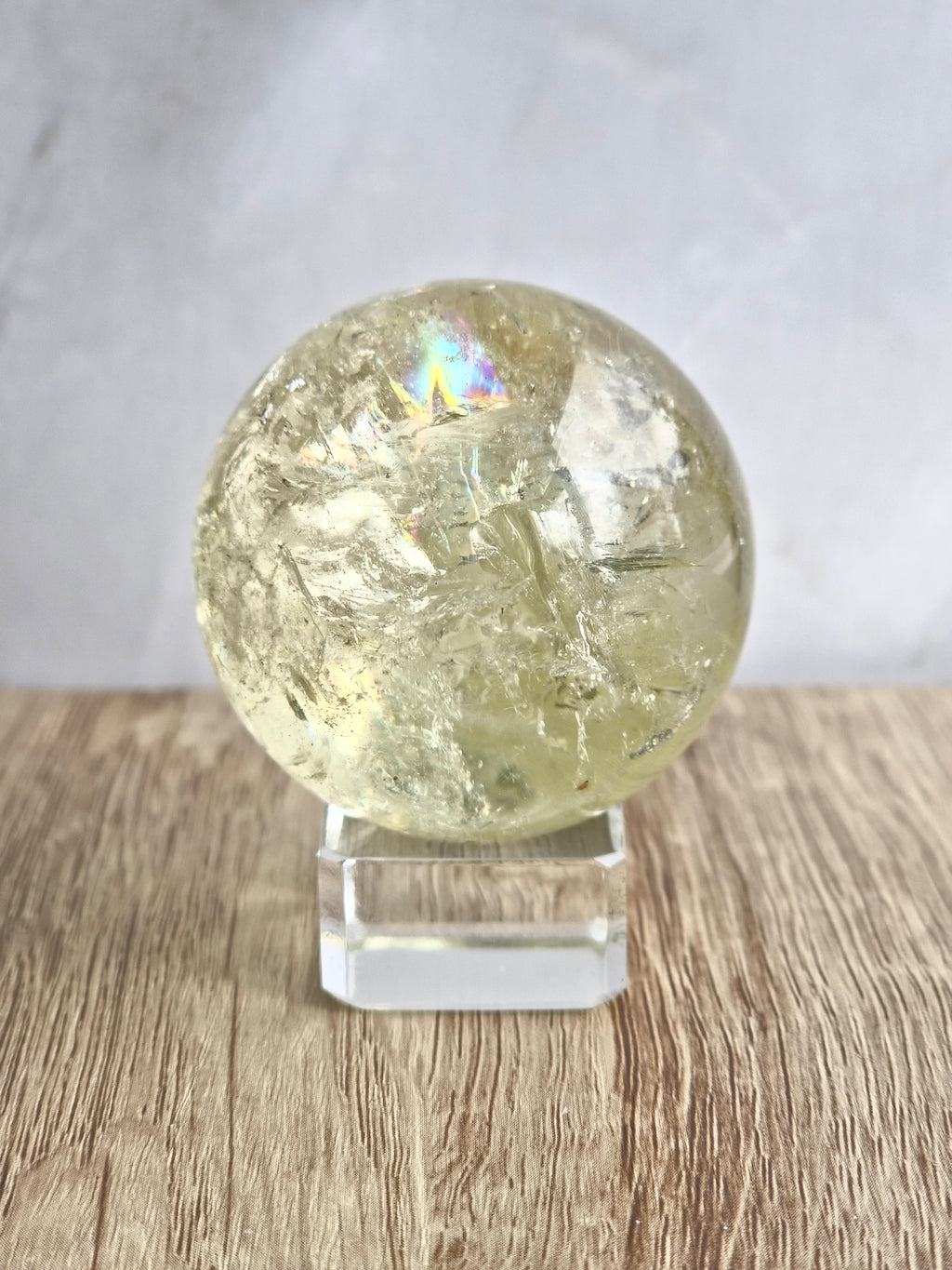 Citrine sphere with tourmaline inclusions