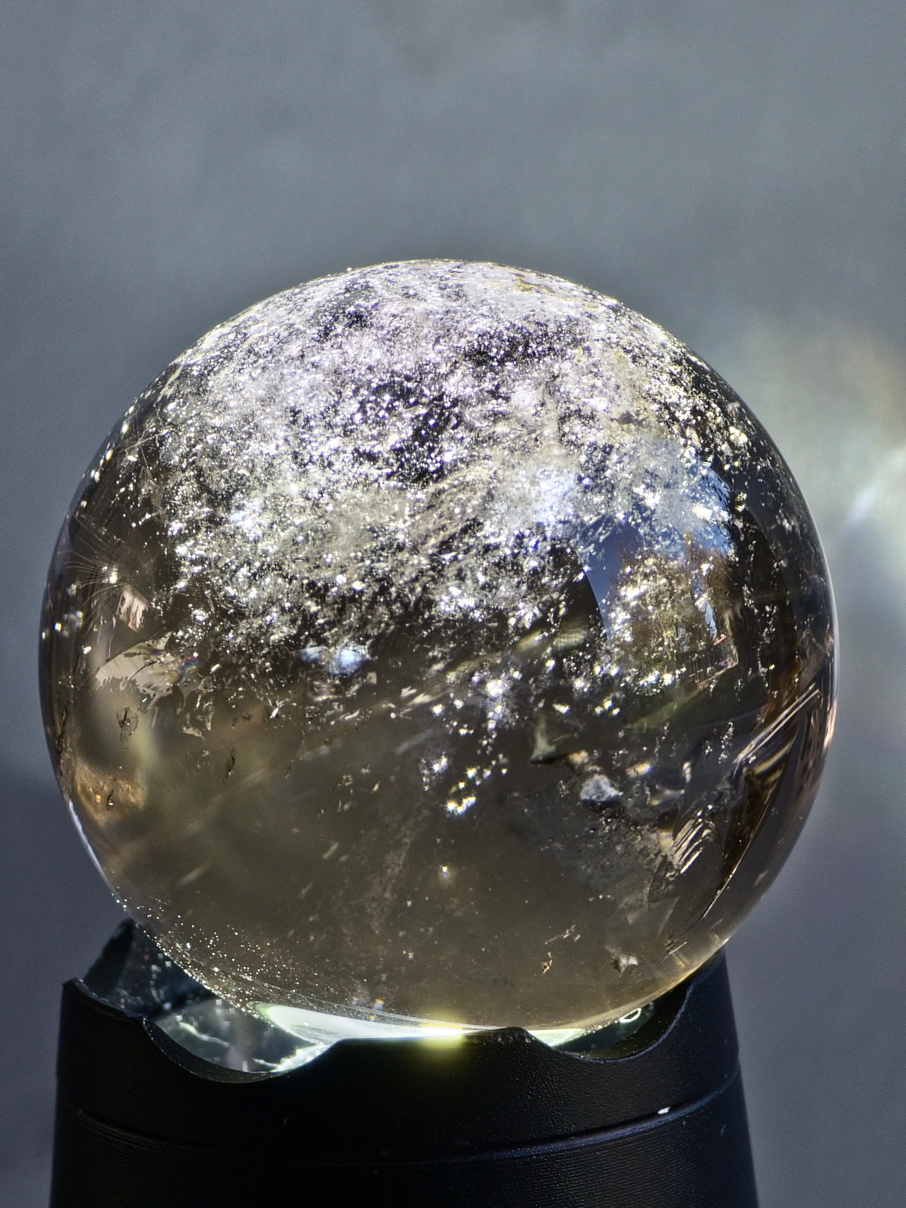 Smokey quartz sphere with rainbows - f