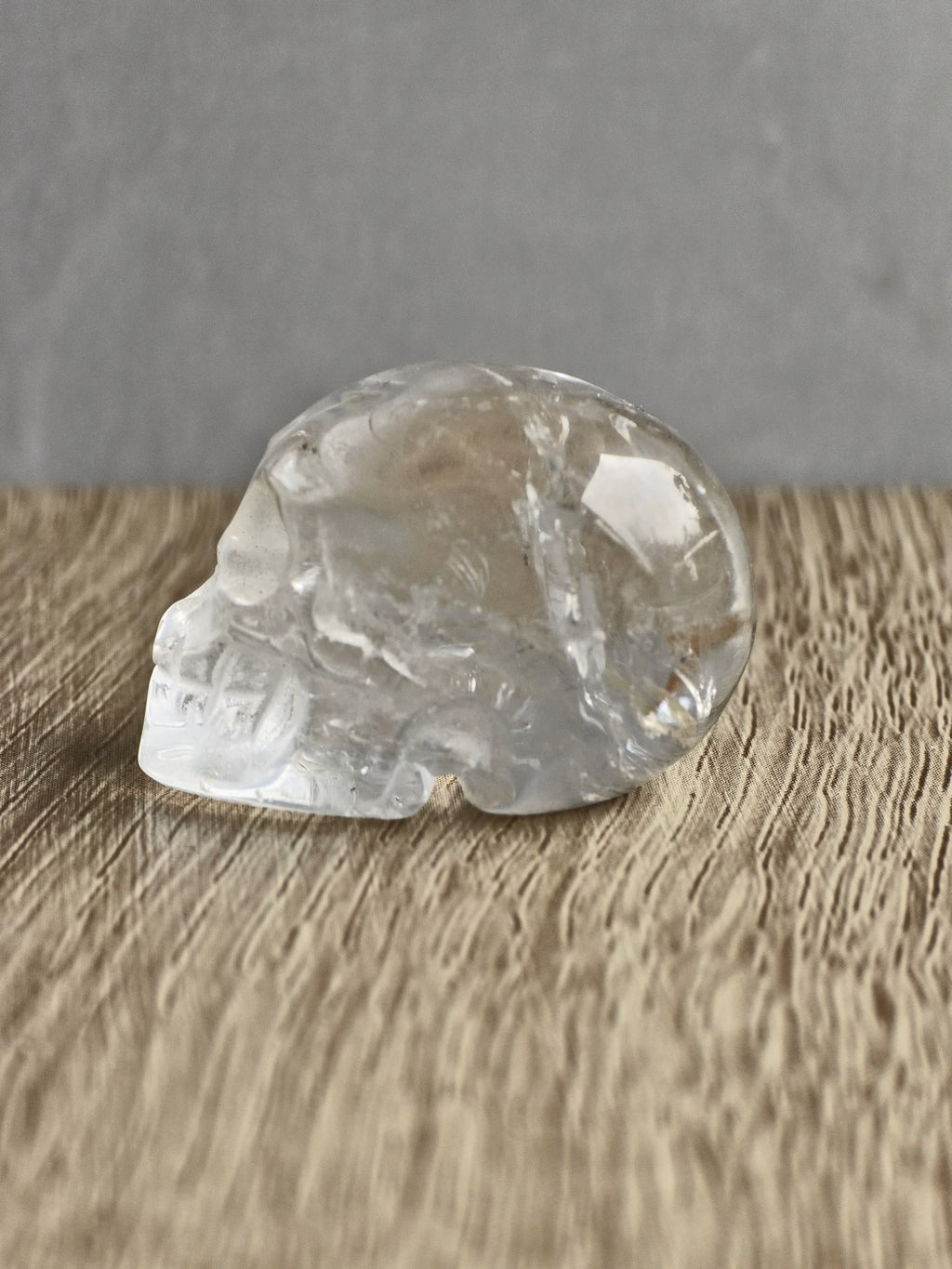 Clear quartz skull with iron inclusions