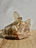 Natural citrine cluster with rainbow inclusion