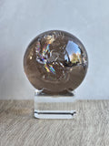 Smokey quartz sphere with rainbows- a