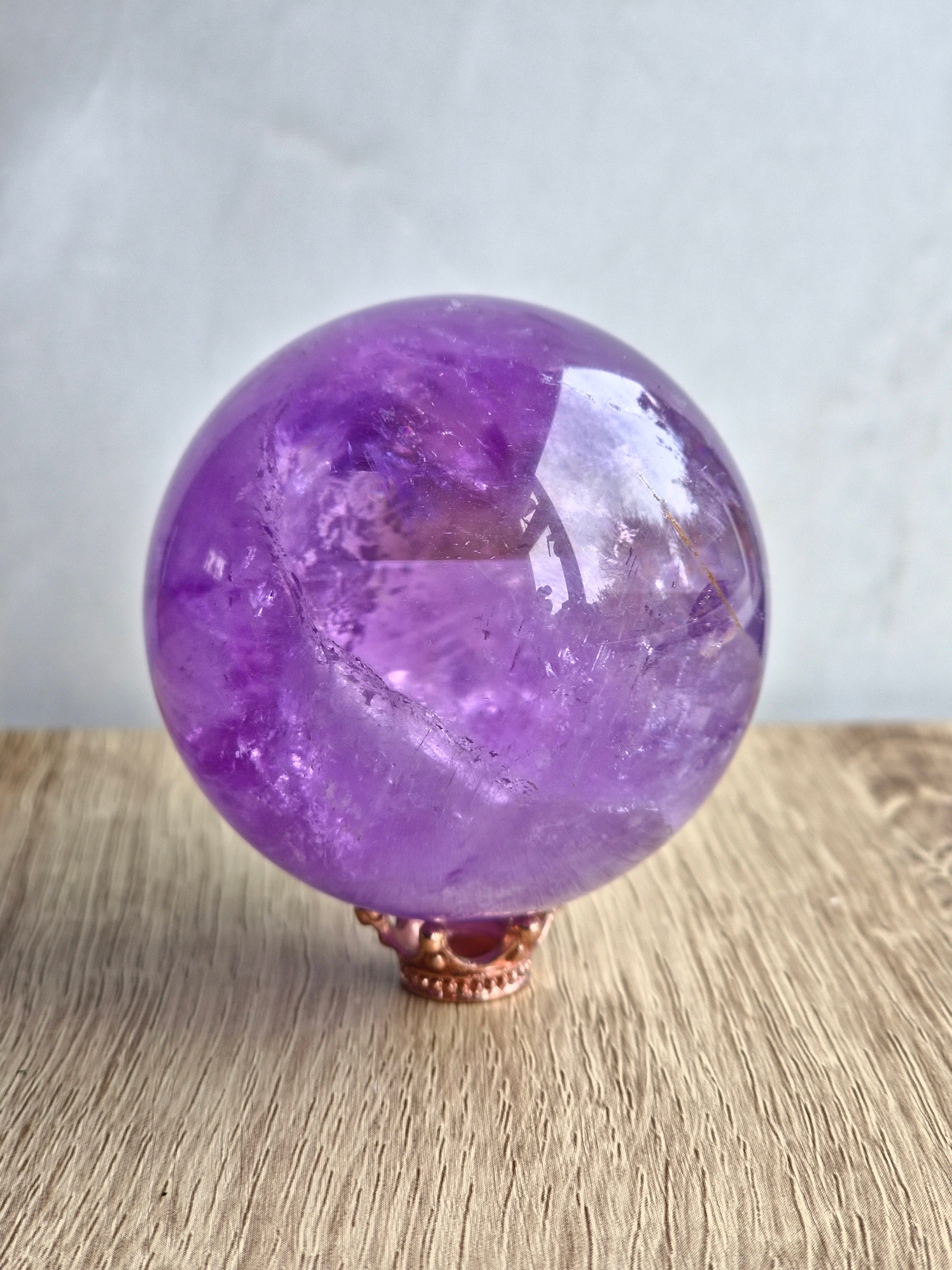 Amethyst sphere with phantom lines and rainbows