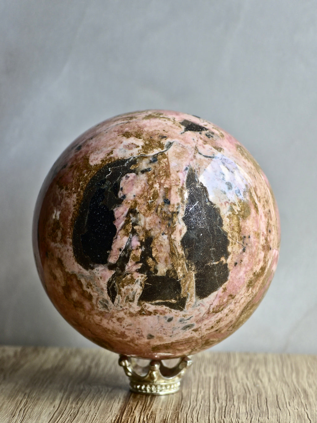 Peruvian Rhodonite Sphere — High-Contrast Pink with Manganese Oxide Matrix