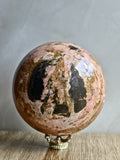 Peruvian Rhodonite Sphere — High-Contrast Pink with Manganese Oxide Matrix