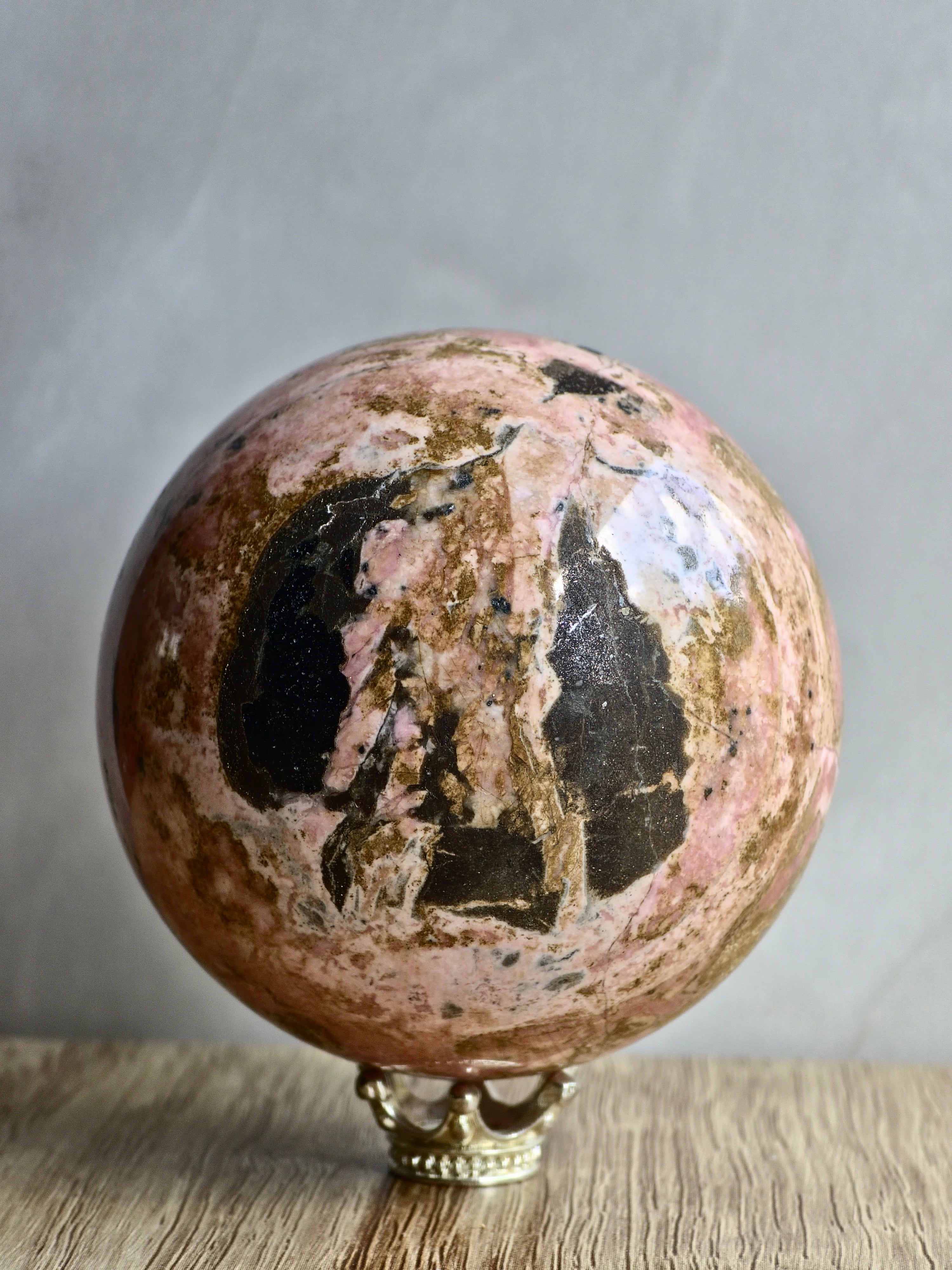 Peruvian Rhodonite Sphere — High-Contrast Pink with Manganese Oxide Matrix