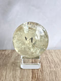 Citrine sphere with tourmaline inclusions