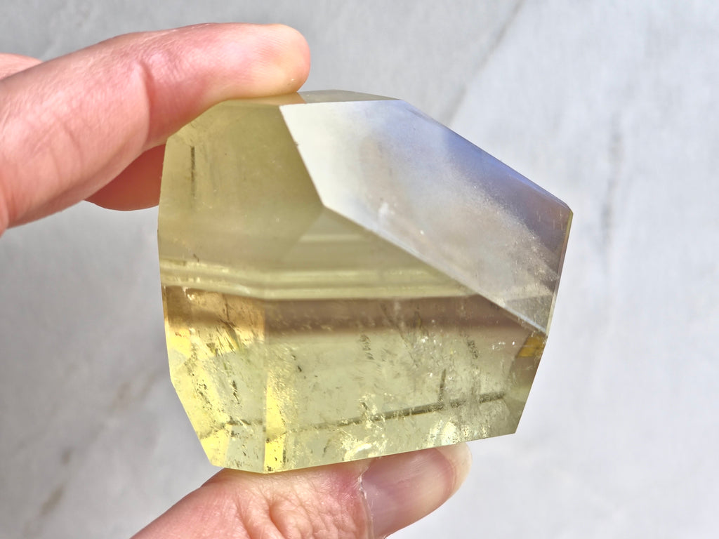 Citrine freeform with white and smoky phantom lines