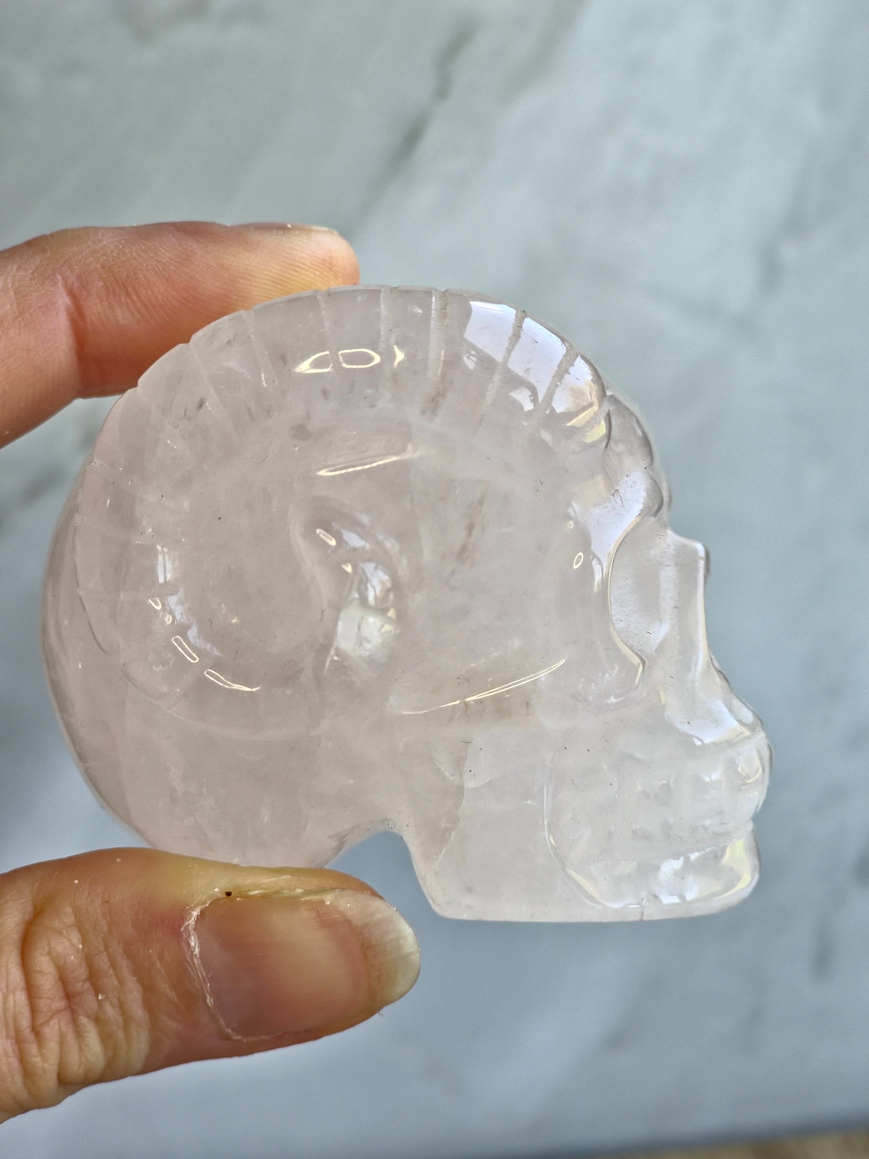 Rose quartz skull with ram horns
