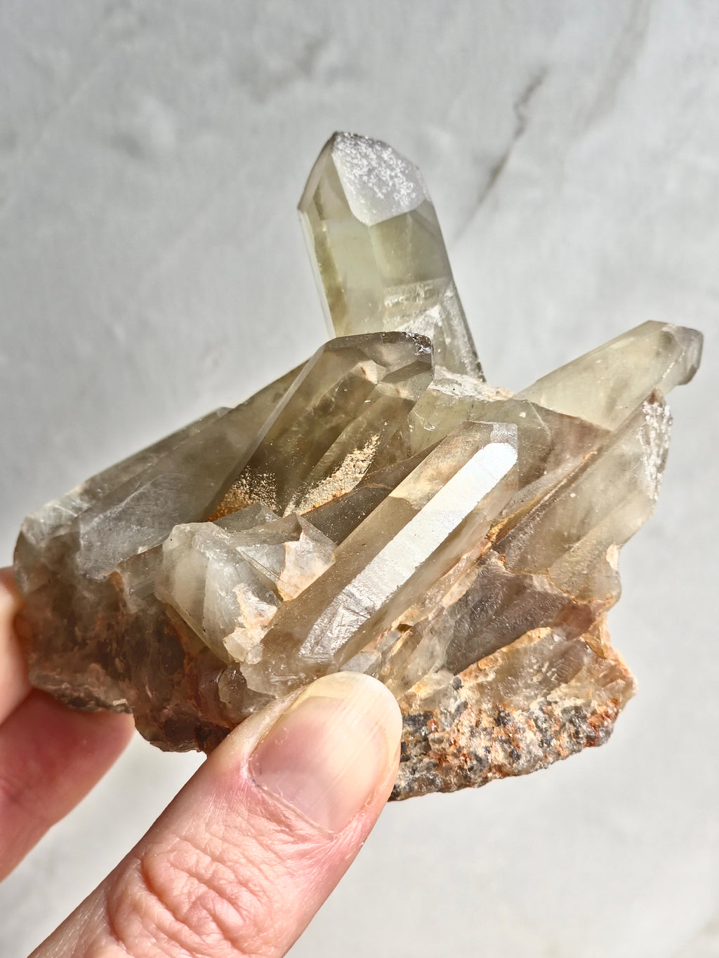 Natural citrine cluster with rainbow inclusion